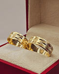 Argollas de matrimonio satinadas hojas olivo 7 mm 8 grs Oro 18k