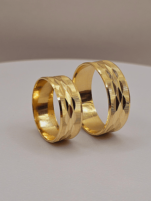 Argollas de matrimonio satinada hojas centro 7 mm 8 grs Oro 18k