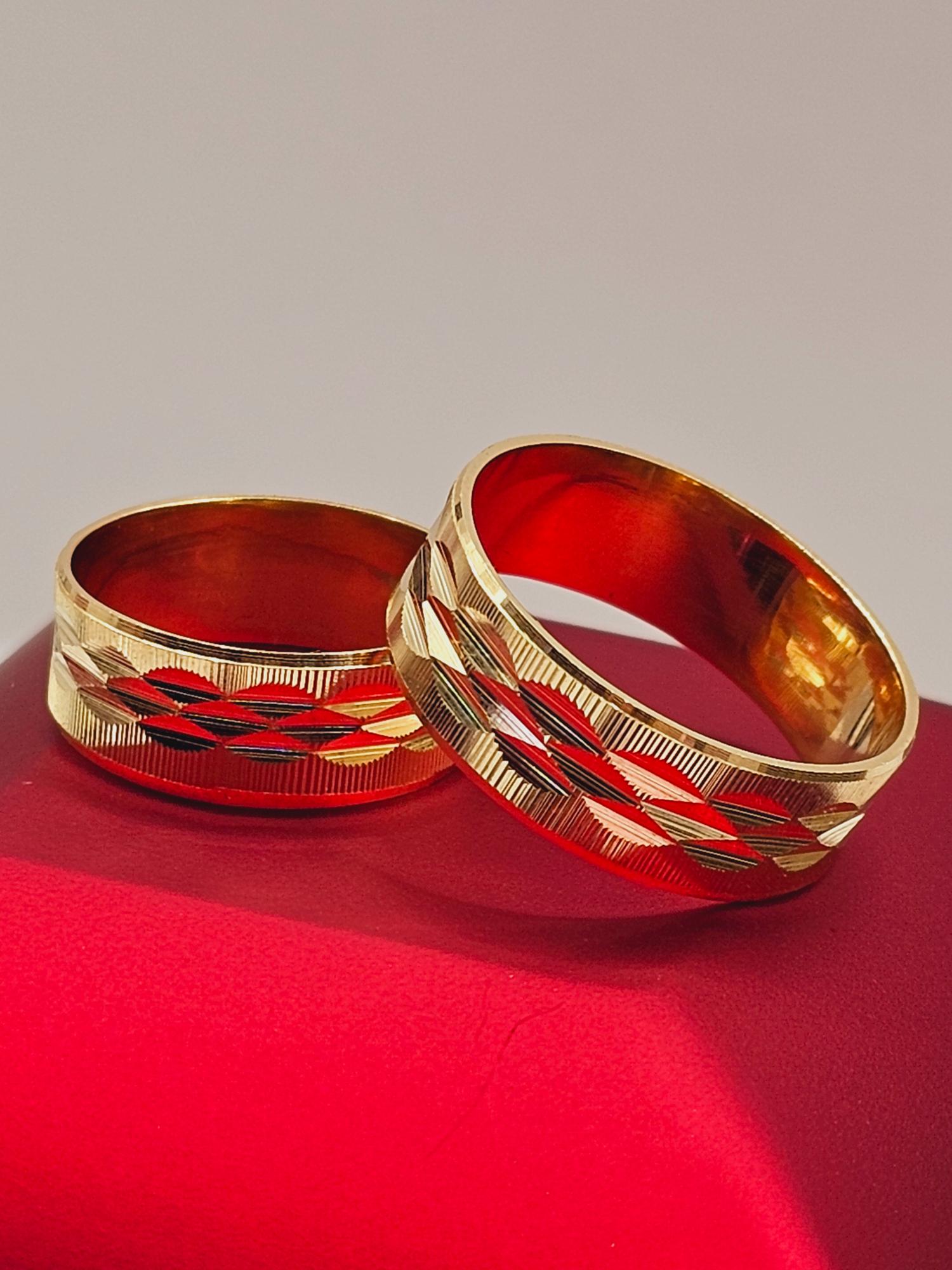 Argollas de matrimonio satinada hojas centro 7 mm 8 grs Oro 18k 1