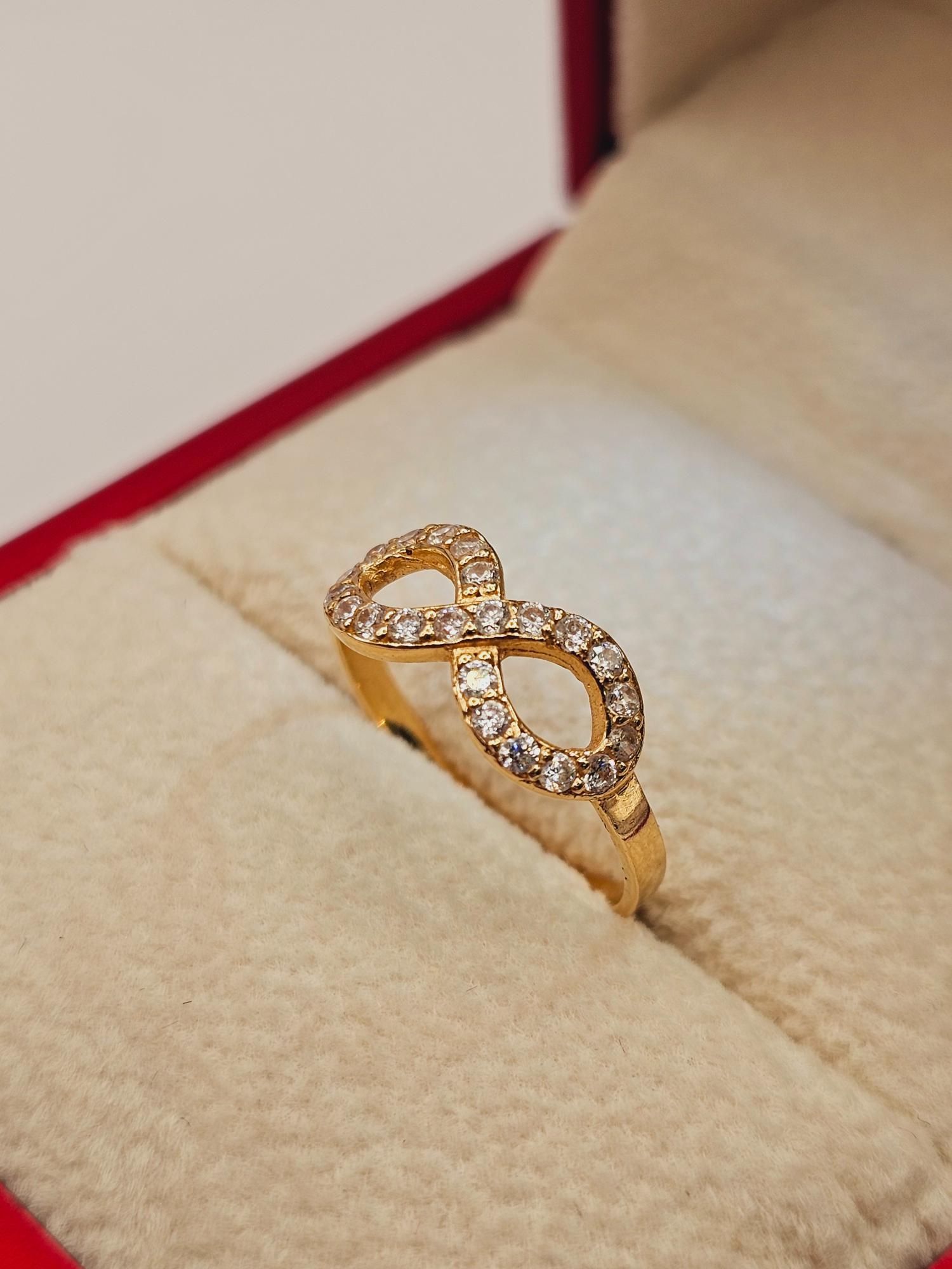 Anillo infinito con circones 1.7 grs Oro 18k 2