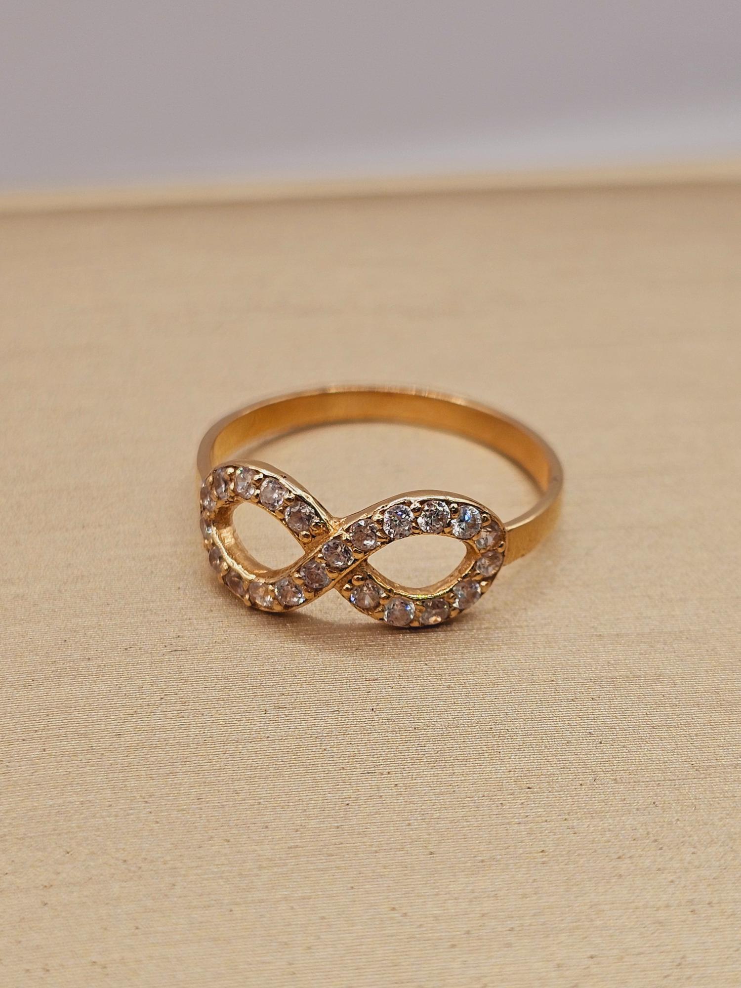 Anillo infinito con circones 1.7 grs Oro 18k 4
