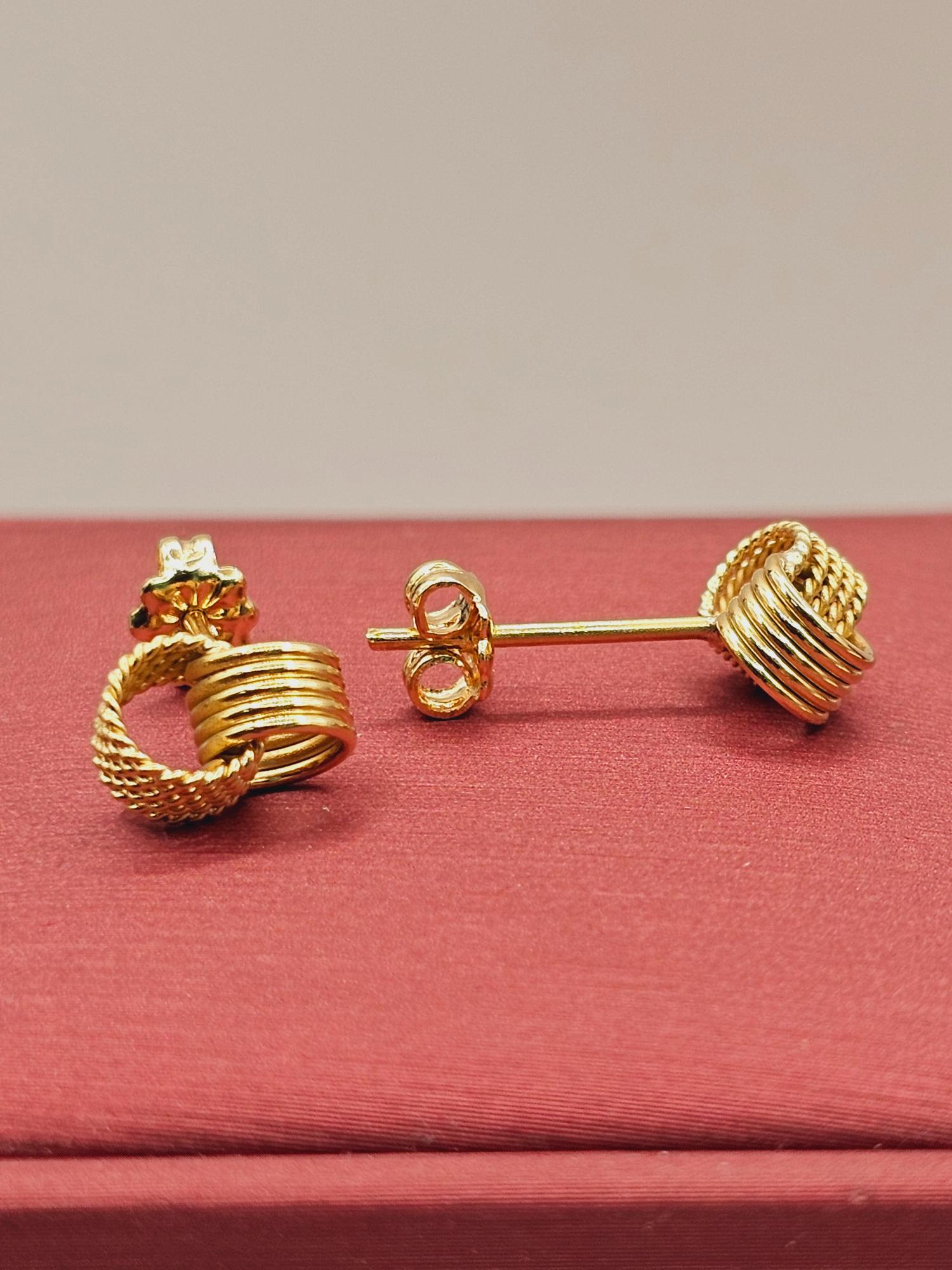 Aros nudo trenza 1 cm 2.3 grs Oro 18k 3