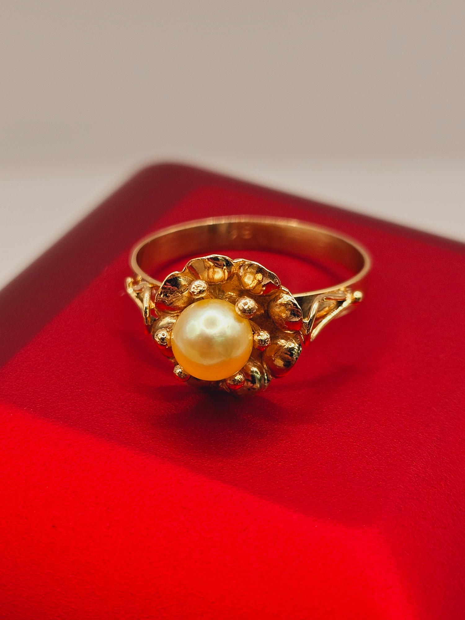 Anillo flor perla cultivada 2 grs Oro 18k 6