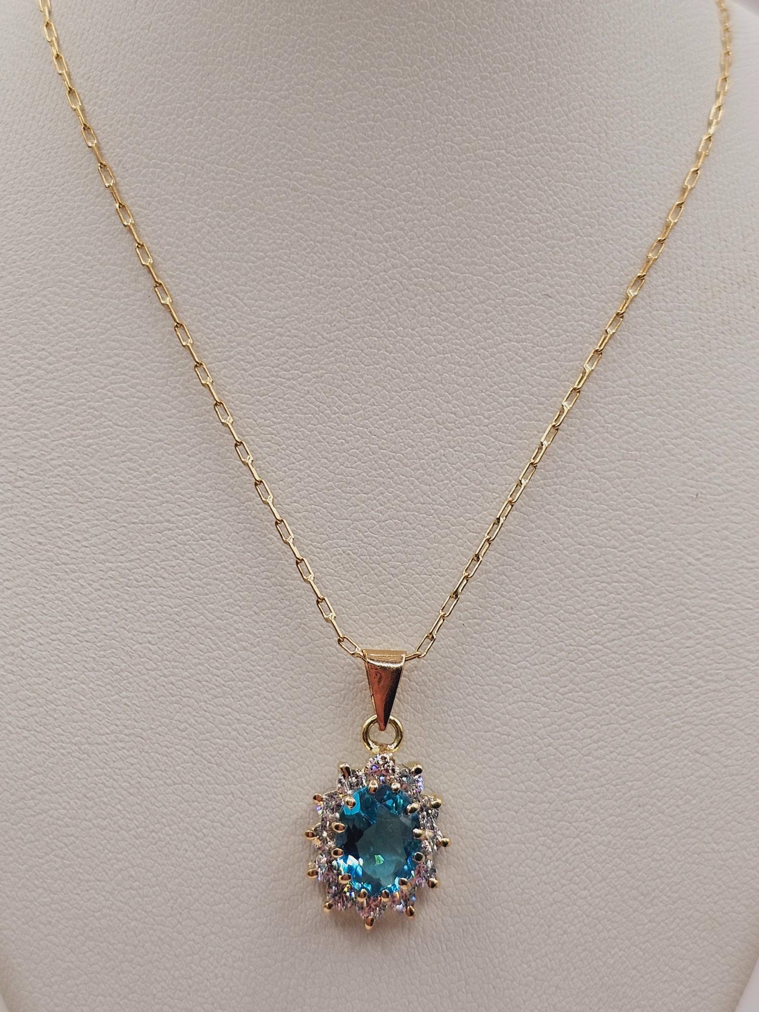 Cadena limada 50 cm y colgante lady agua marina 2.2 cm 4.3 grs Oro 18k  4