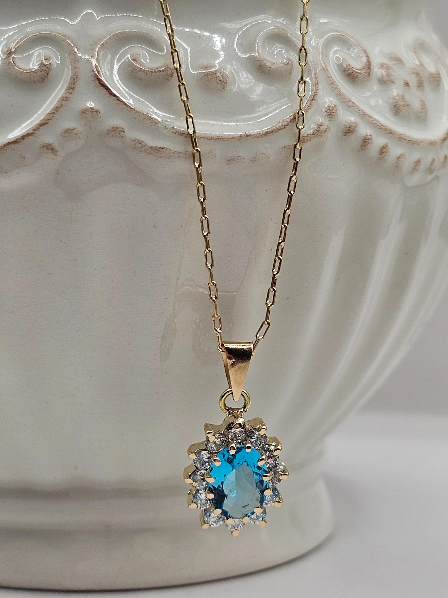 Cadena limada 50 cm y colgante lady agua marina 2.2 cm 4.3 grs Oro 18k  5