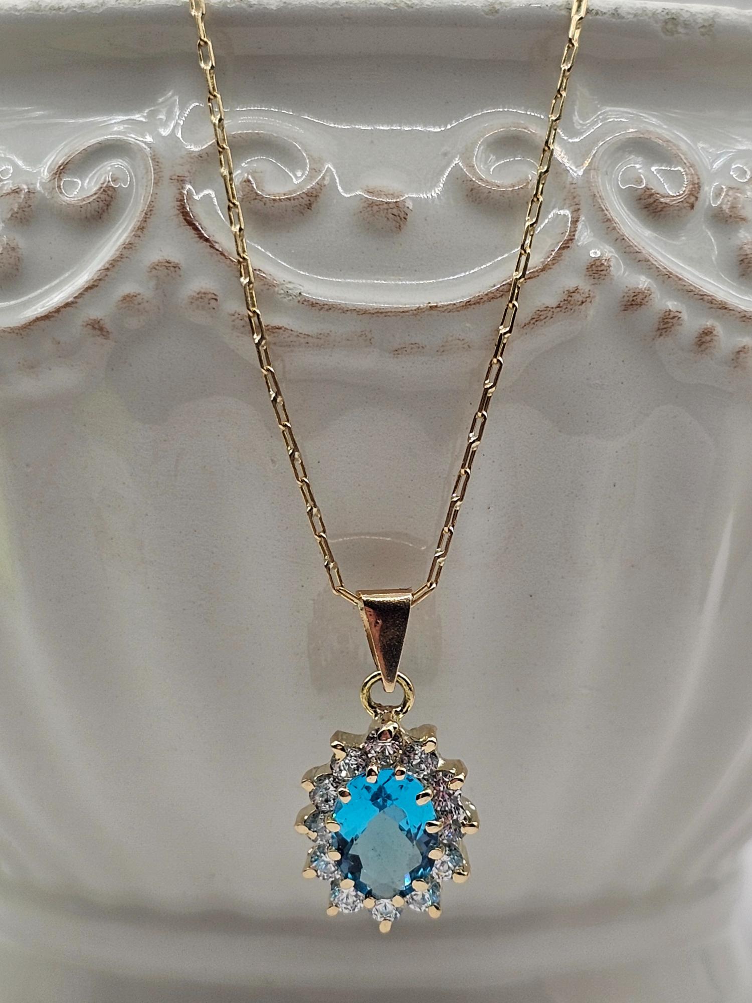 Cadena limada 50 cm y colgante lady agua marina 2.2 cm 4.3 grs Oro 18k  1