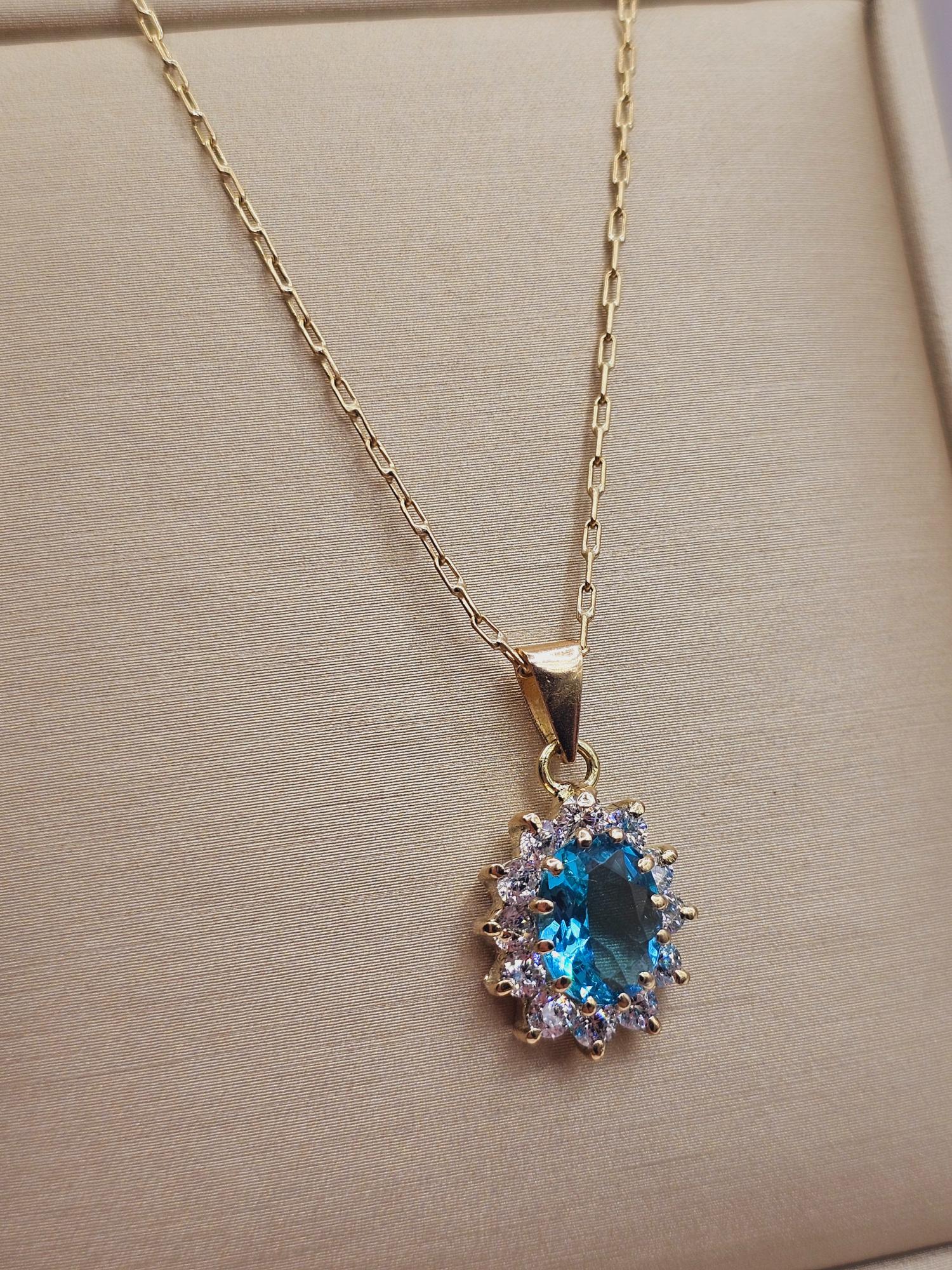 Cadena limada 50 cm y colgante lady agua marina 2.2 cm 4.3 grs Oro 18k  2