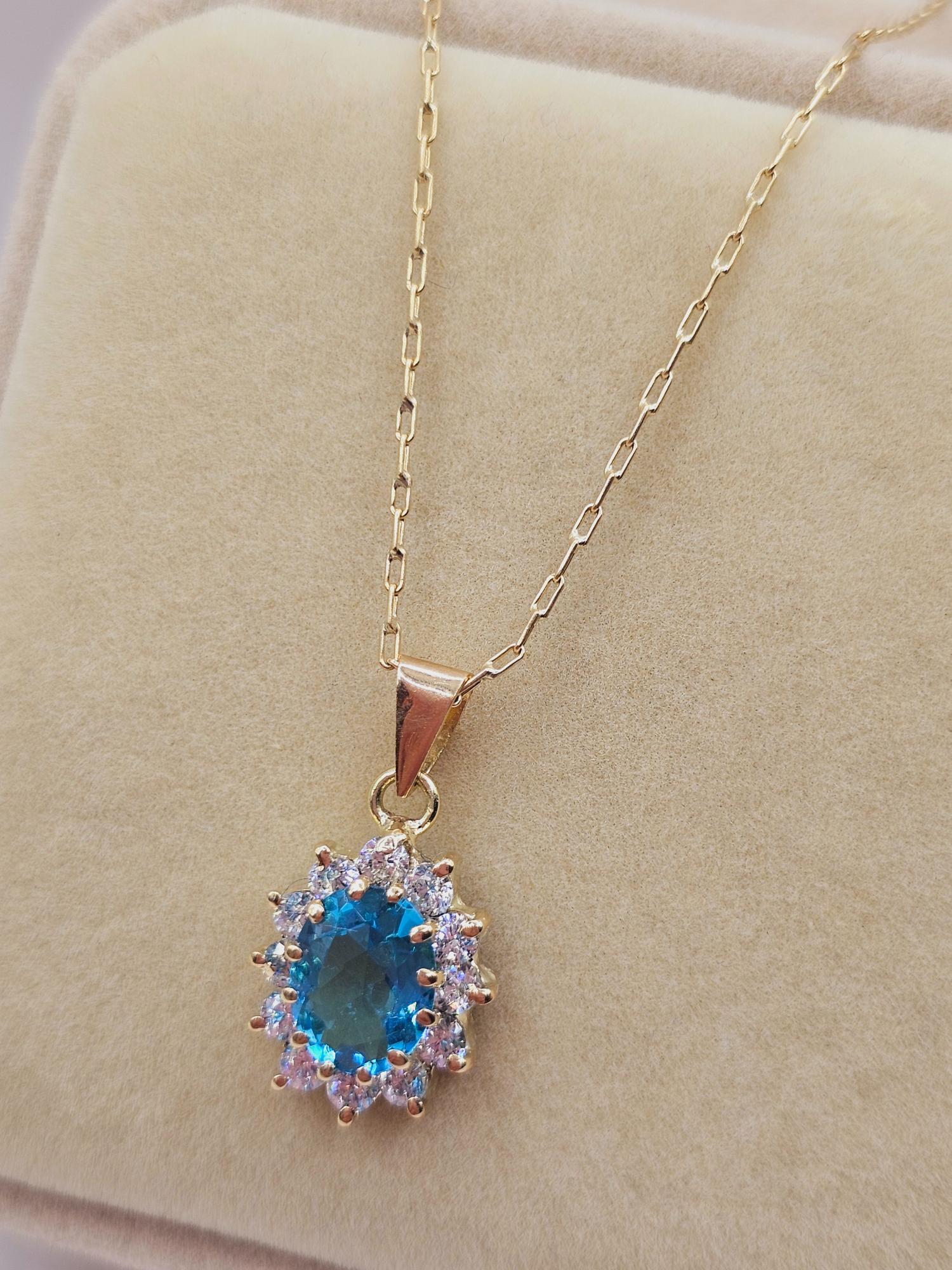 Cadena limada 50 cm y colgante lady agua marina 2.2 cm 4.3 grs Oro 18k  6