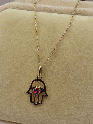 Cadena limada 50 cm y colgante mano de fátima 1.9 grs Oro 18k