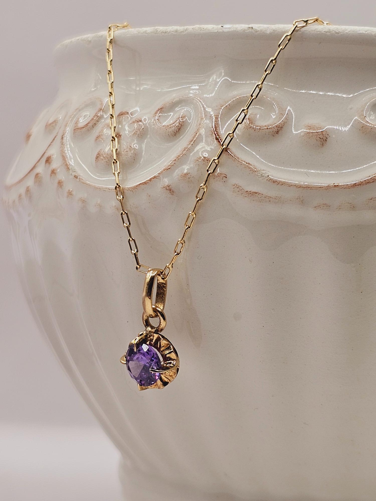 Cadena limada 50 cm y colgante chaton amatista 1.7 cm 3 grs Oro 18k 1