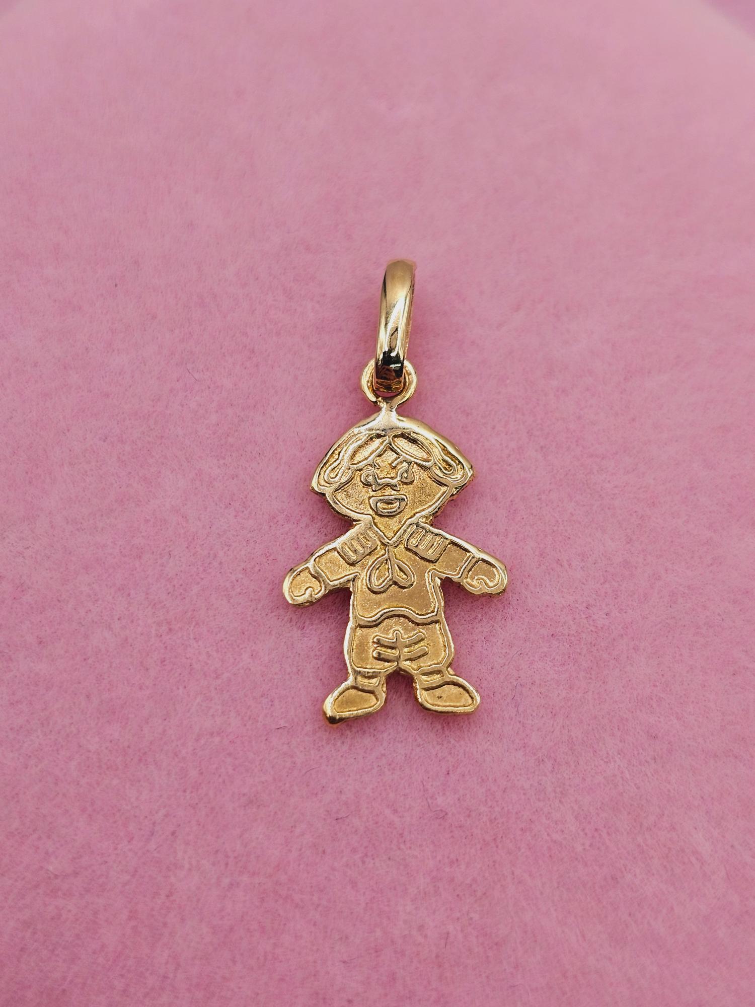 Colgante niño 2.1 cm 0.7 grs Oro 18k 2