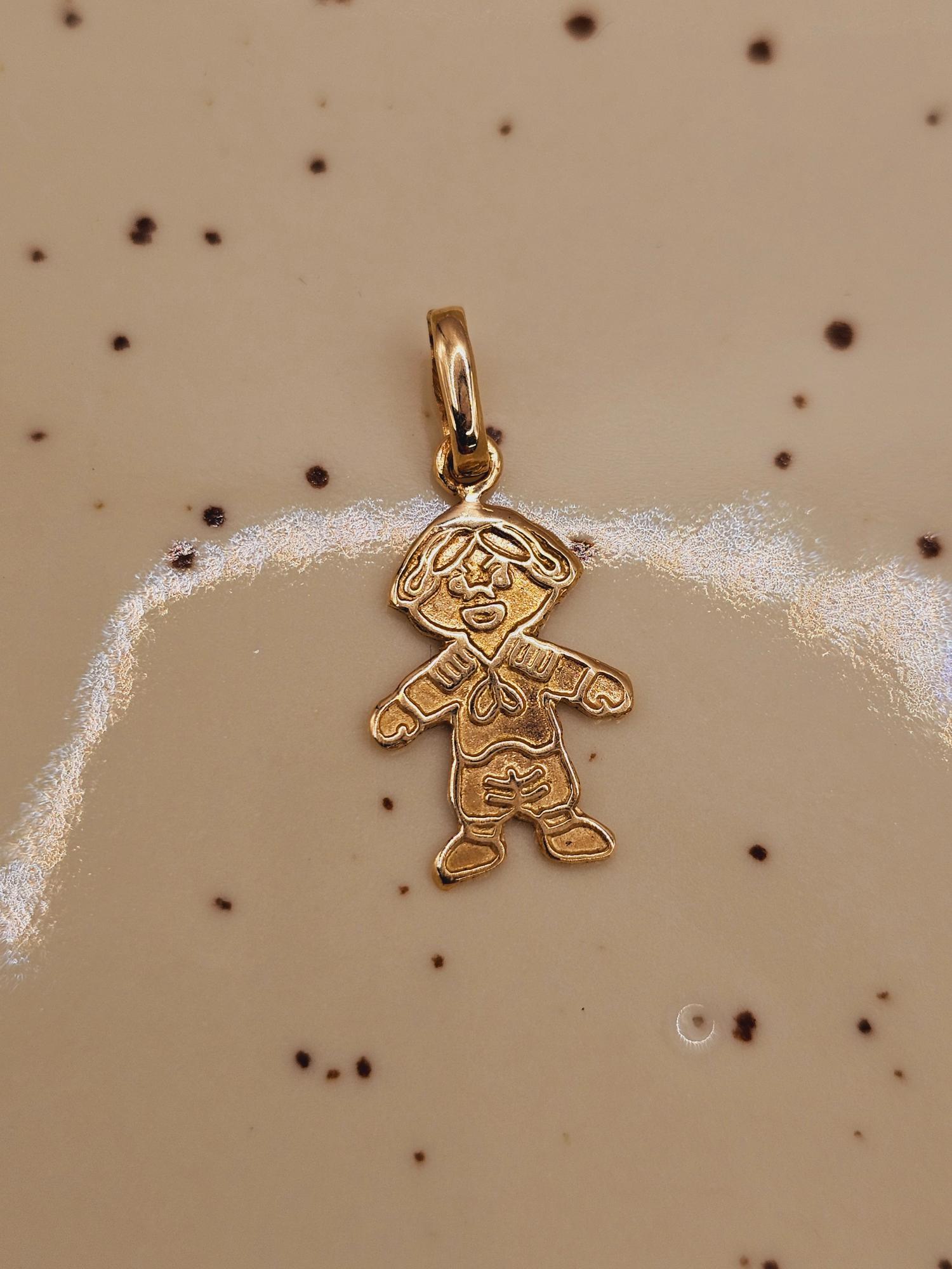 Colgante niño 2.1 cm 0.7 grs Oro 18k 4