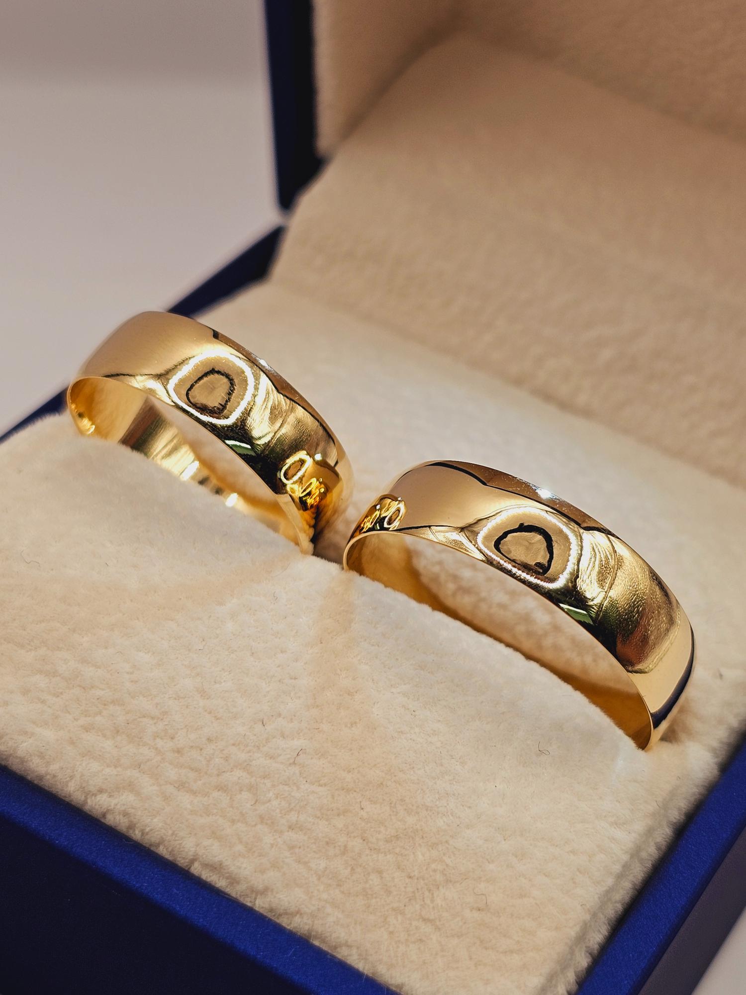 Argollas media caña 6 mm 6 grs Oro 18k 1