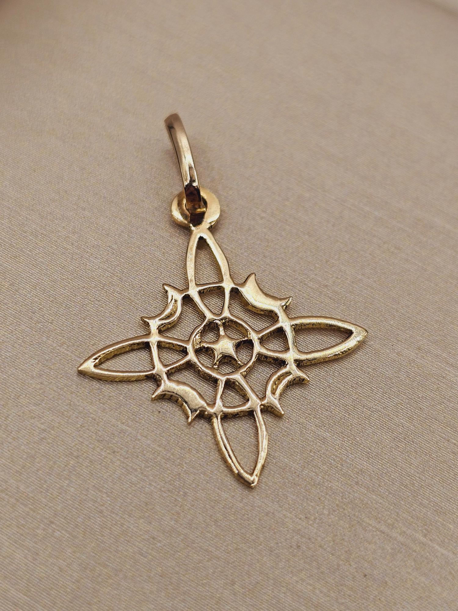 Colgante nudo de bruja 2.1 cm 1.1 grs Oro 18k 1