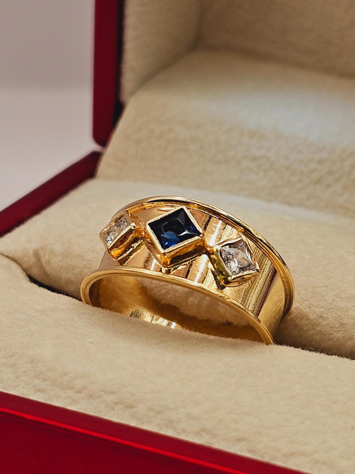 Anillo rombos zafiro y circones 3.4 grs Oro 18k 1