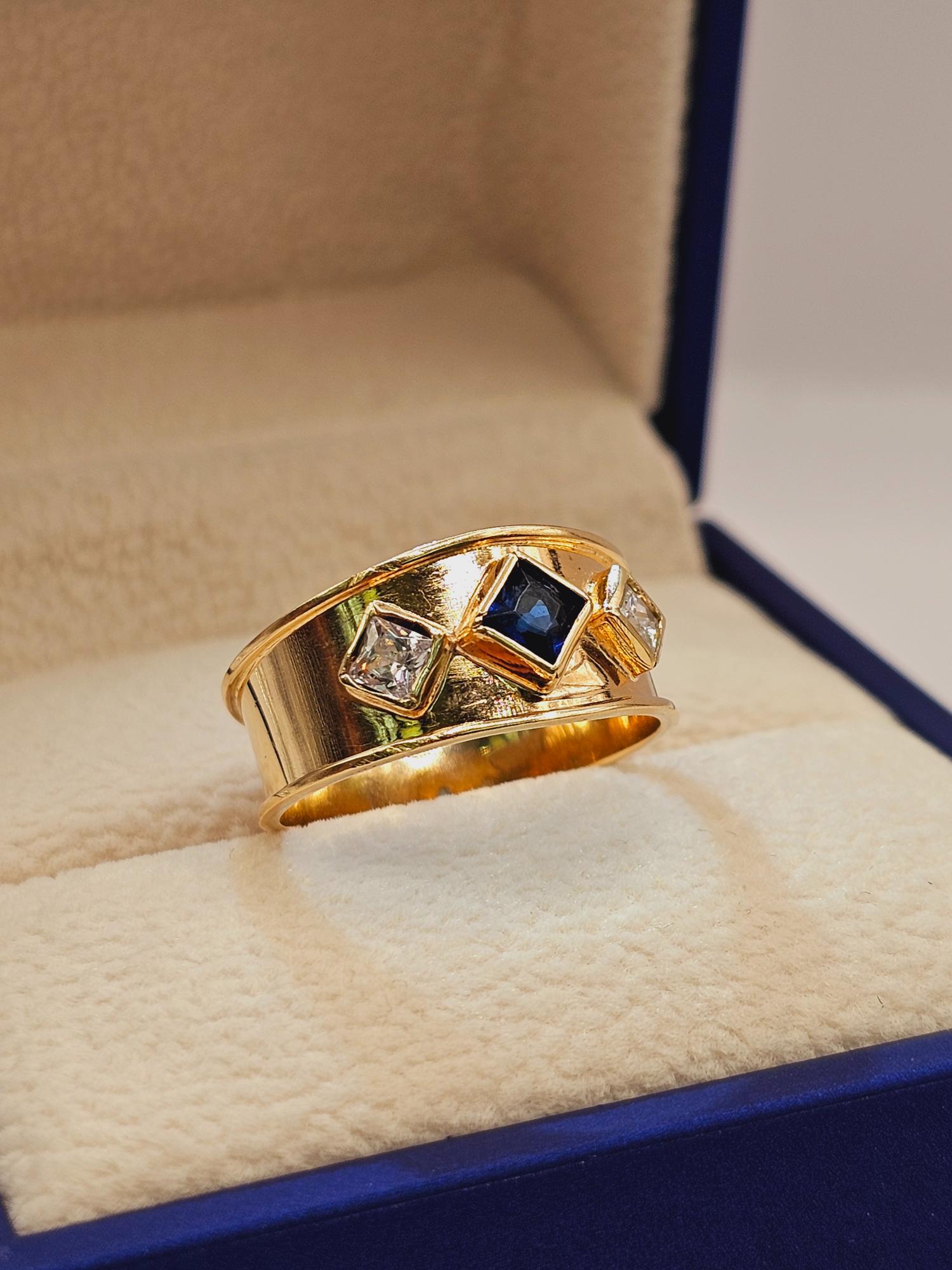 Anillo rombos zafiro y circones 3.4 grs Oro 18k 5