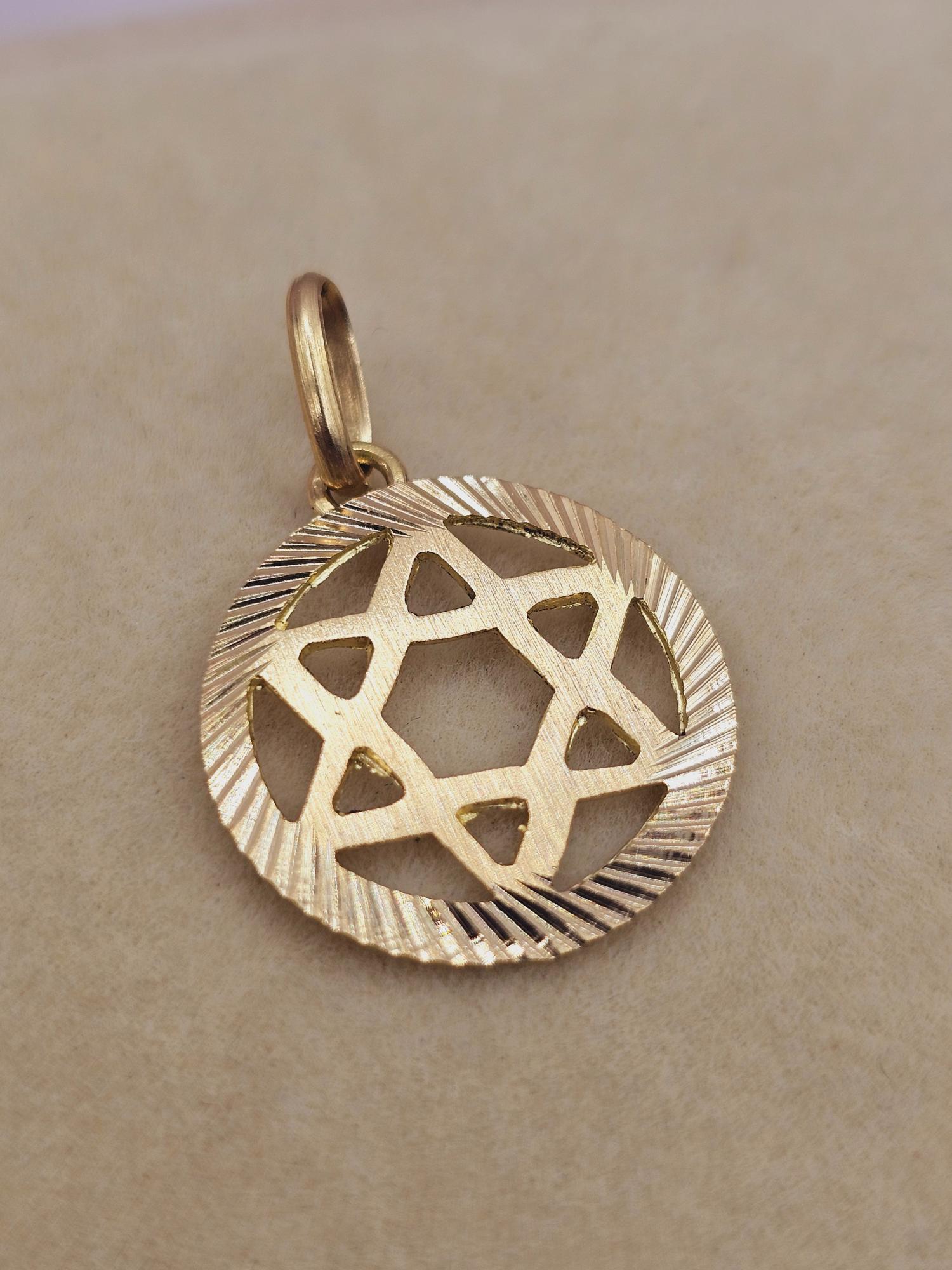 Colgante estrella de David 1.7 cm 1.2 grs Oro 18k 1