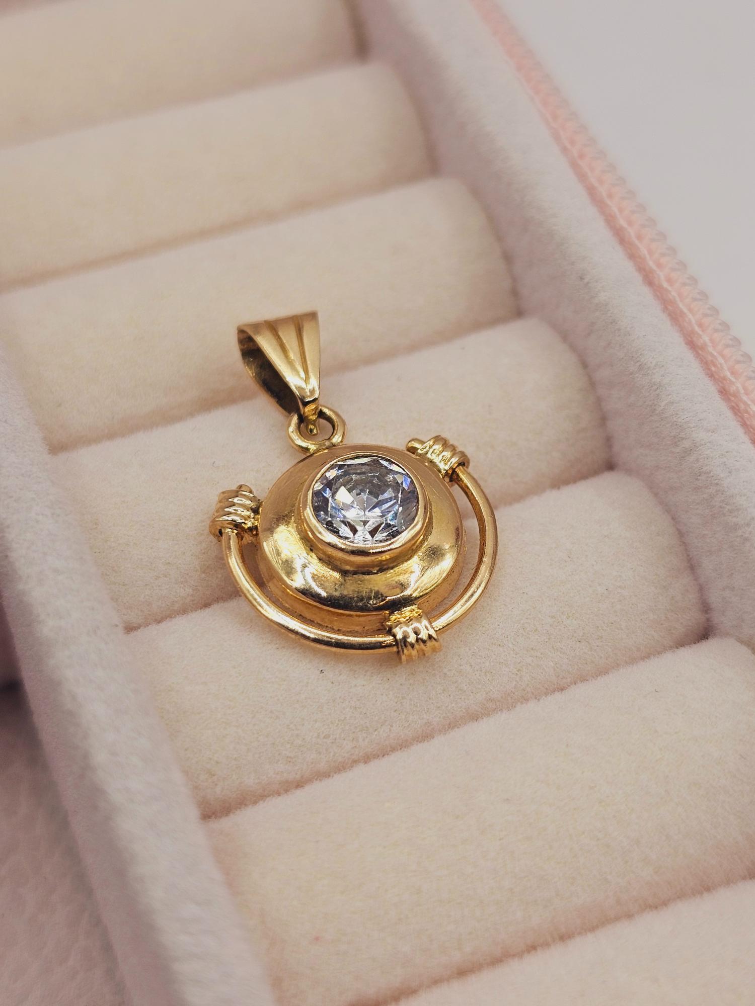 Colgante Punto de luz circón 2.2 cm 2 grs Oro 18k 1