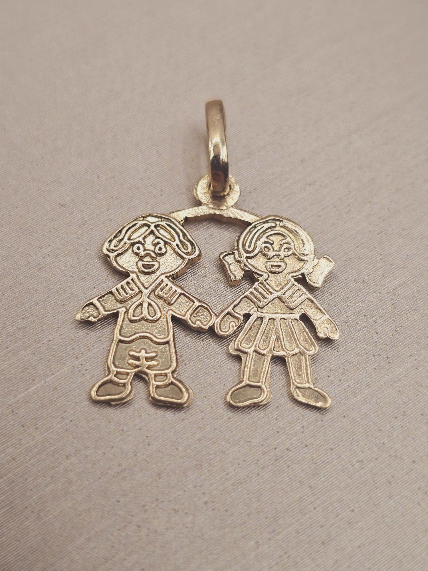 Colgante niña y niño 2.3 cm 1.6 grs Oro 18k 4