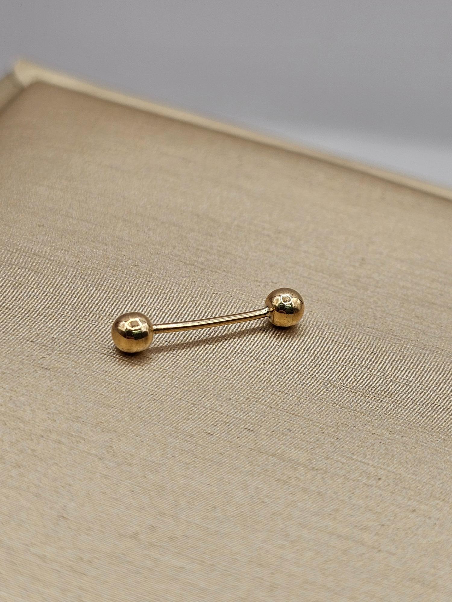 Piercing bolitas 1.6 cm 0.4 grs Oro 18k 1