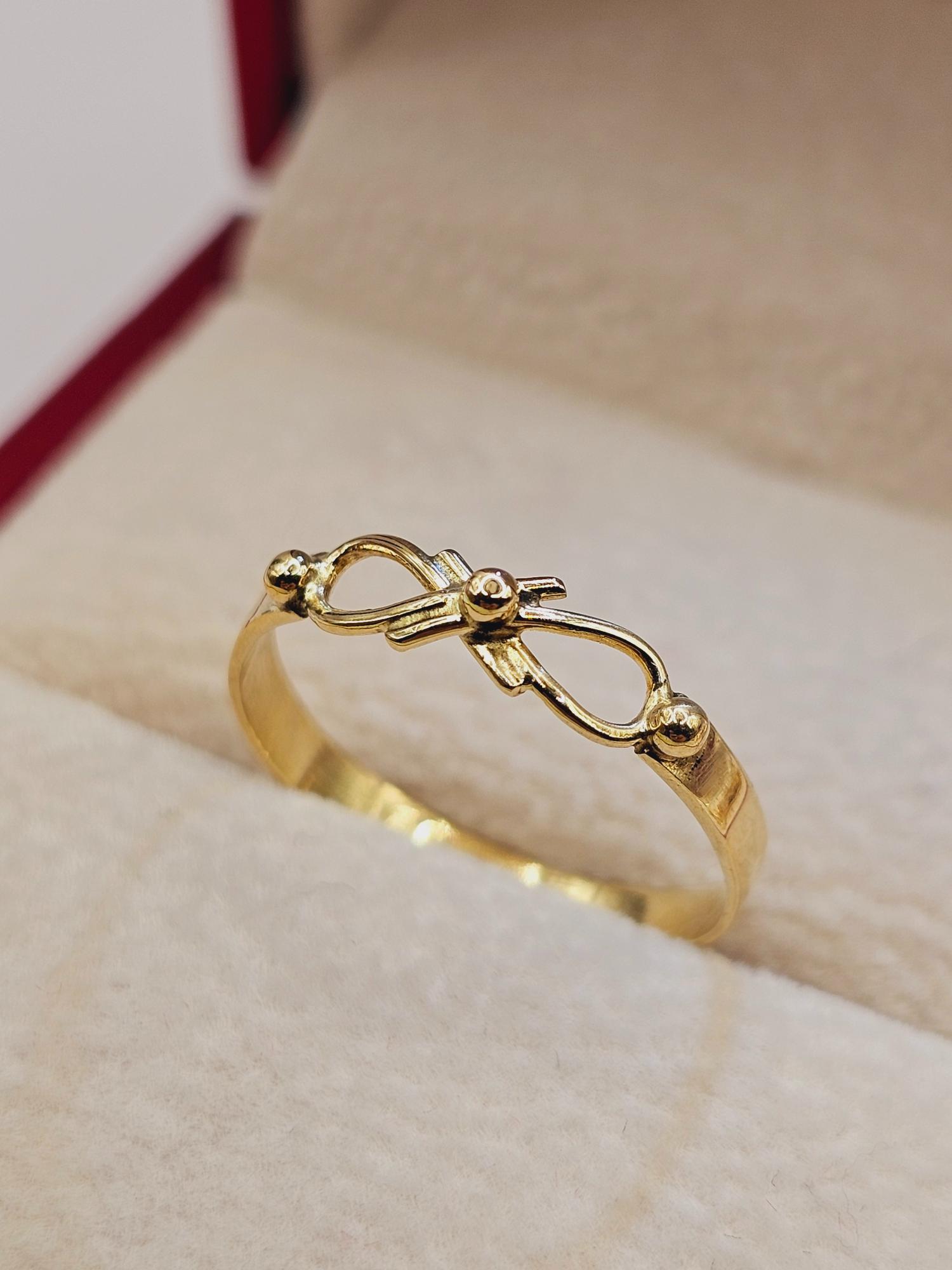 Anillo infinito liso 1.6 grs Oro 18k 4