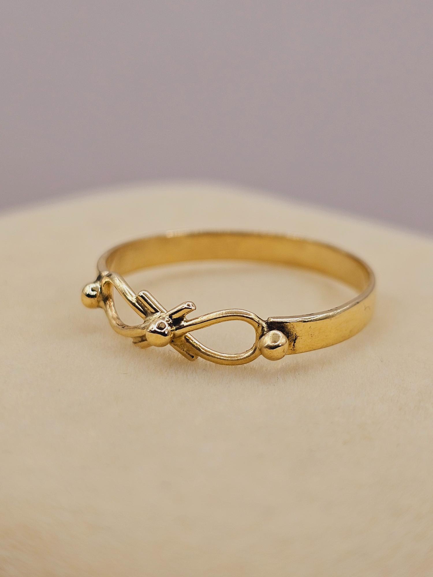 Anillo infinito liso 1.6 grs Oro 18k 7