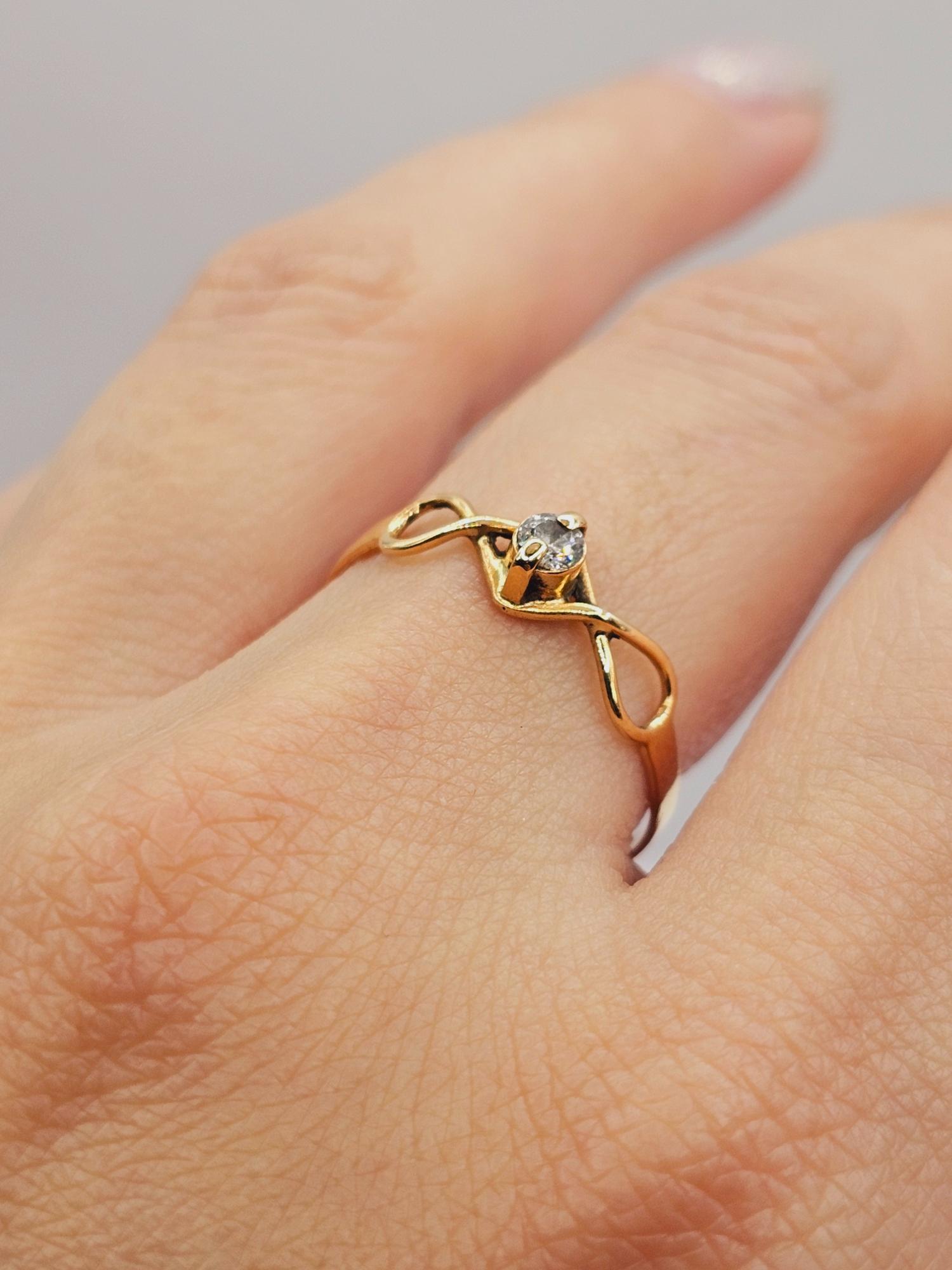 Anillo Infinito circón 1.5 grs Oro 18k 2