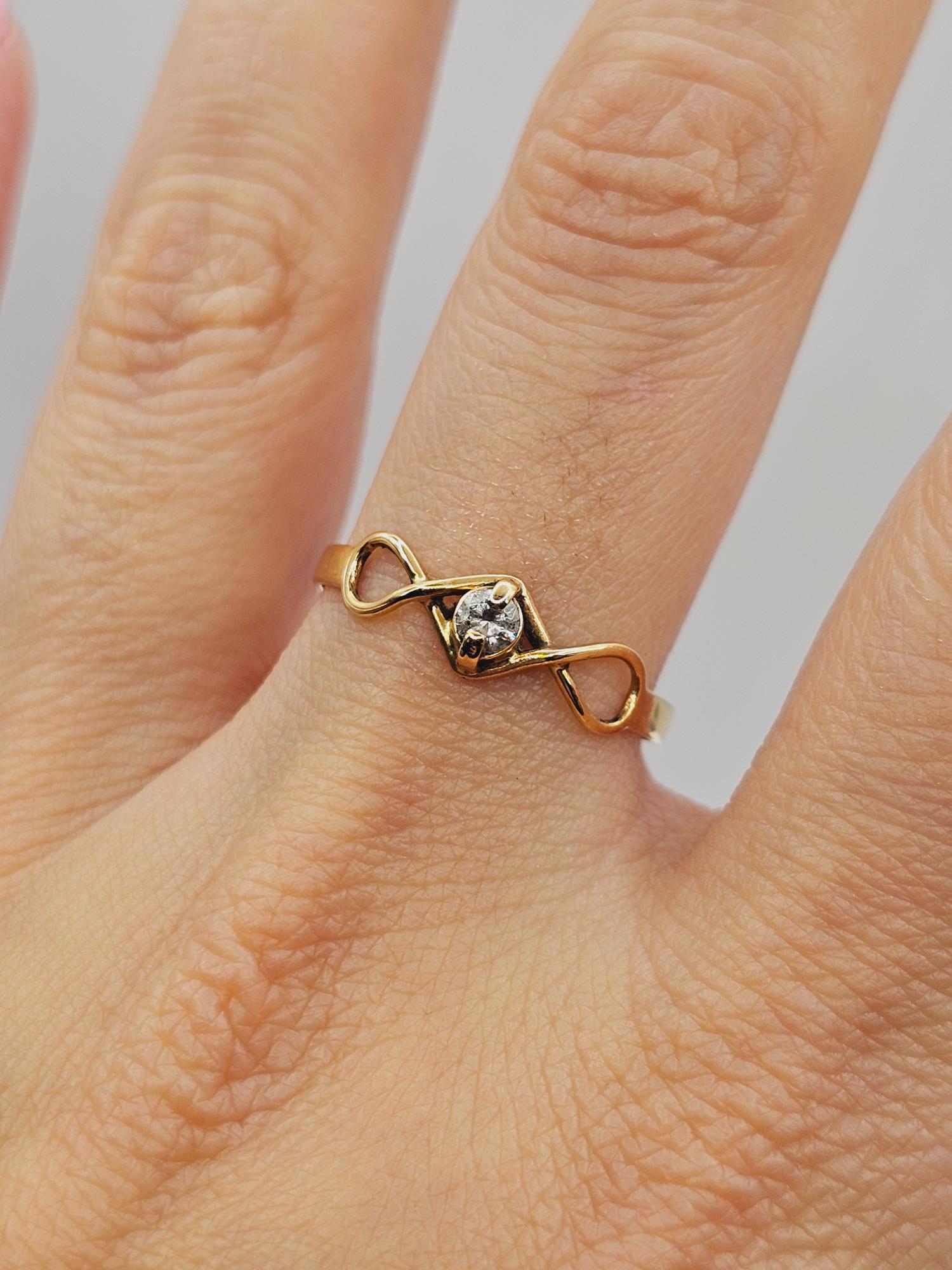 Anillo Infinito circón 1.5 grs Oro 18k 3