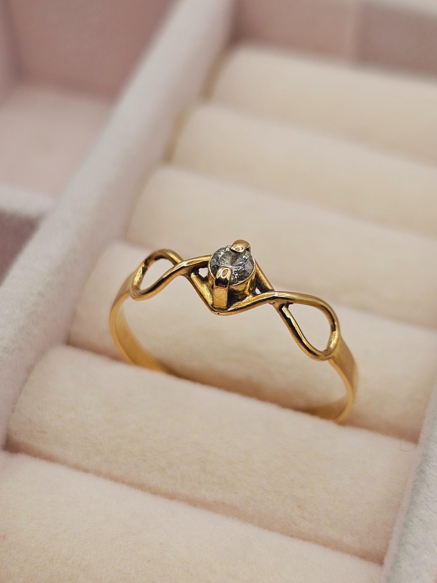 Anillo Infinito circón 1.5 grs Oro 18k 4