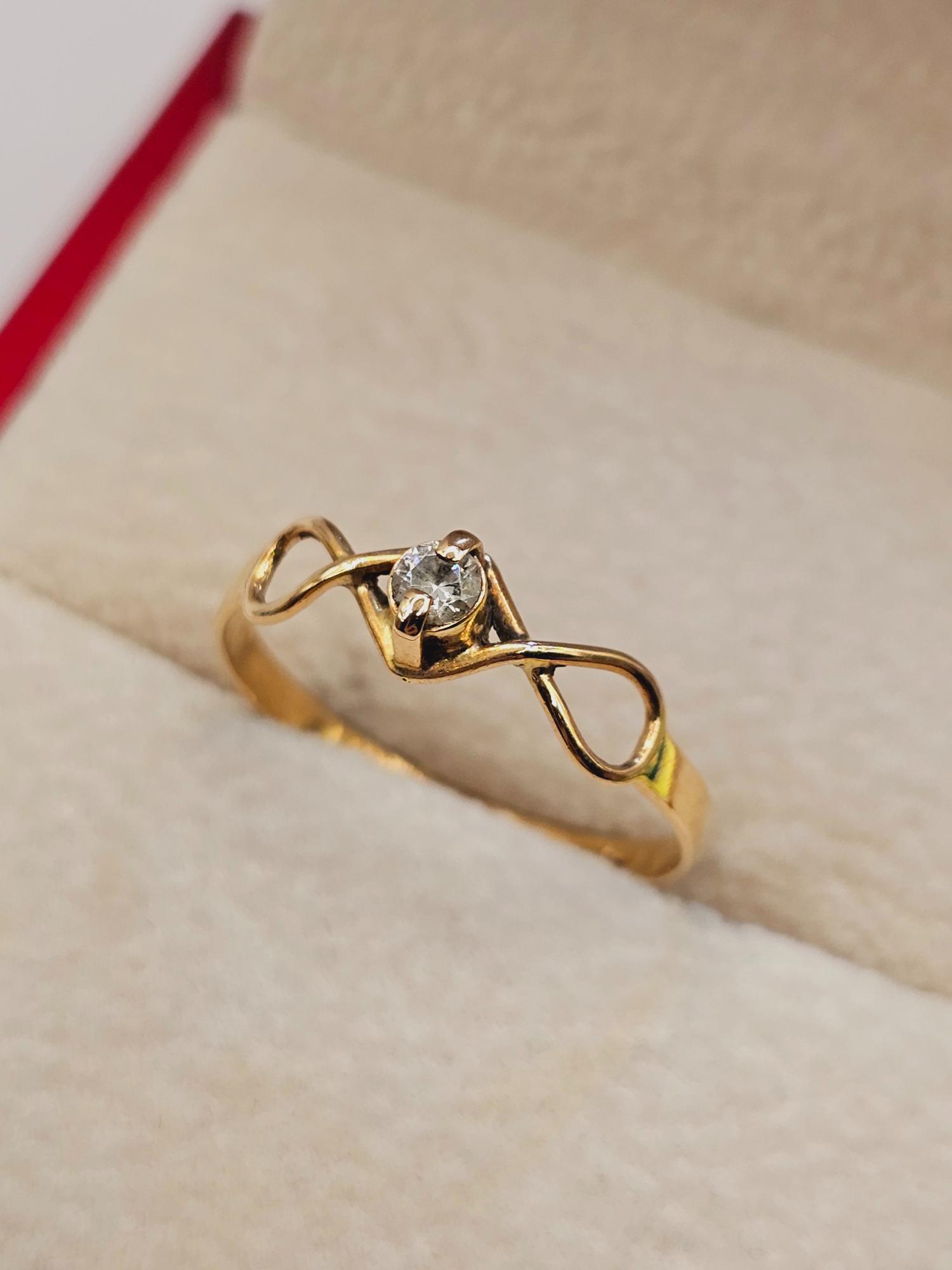 Anillo Infinito circón 1.5 grs Oro 18k 6