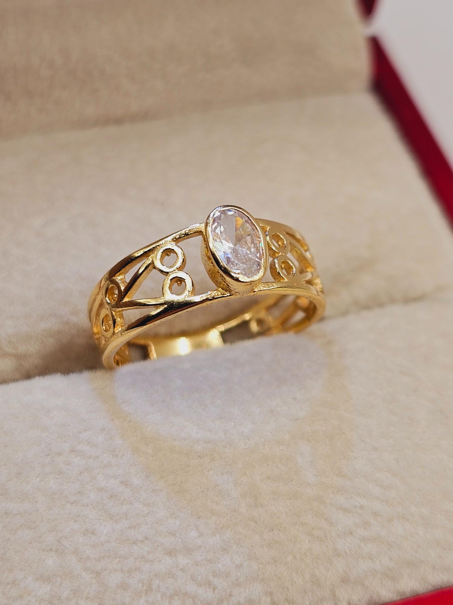 Anillo olimpo circones 2.6 grs Oro 18k 3