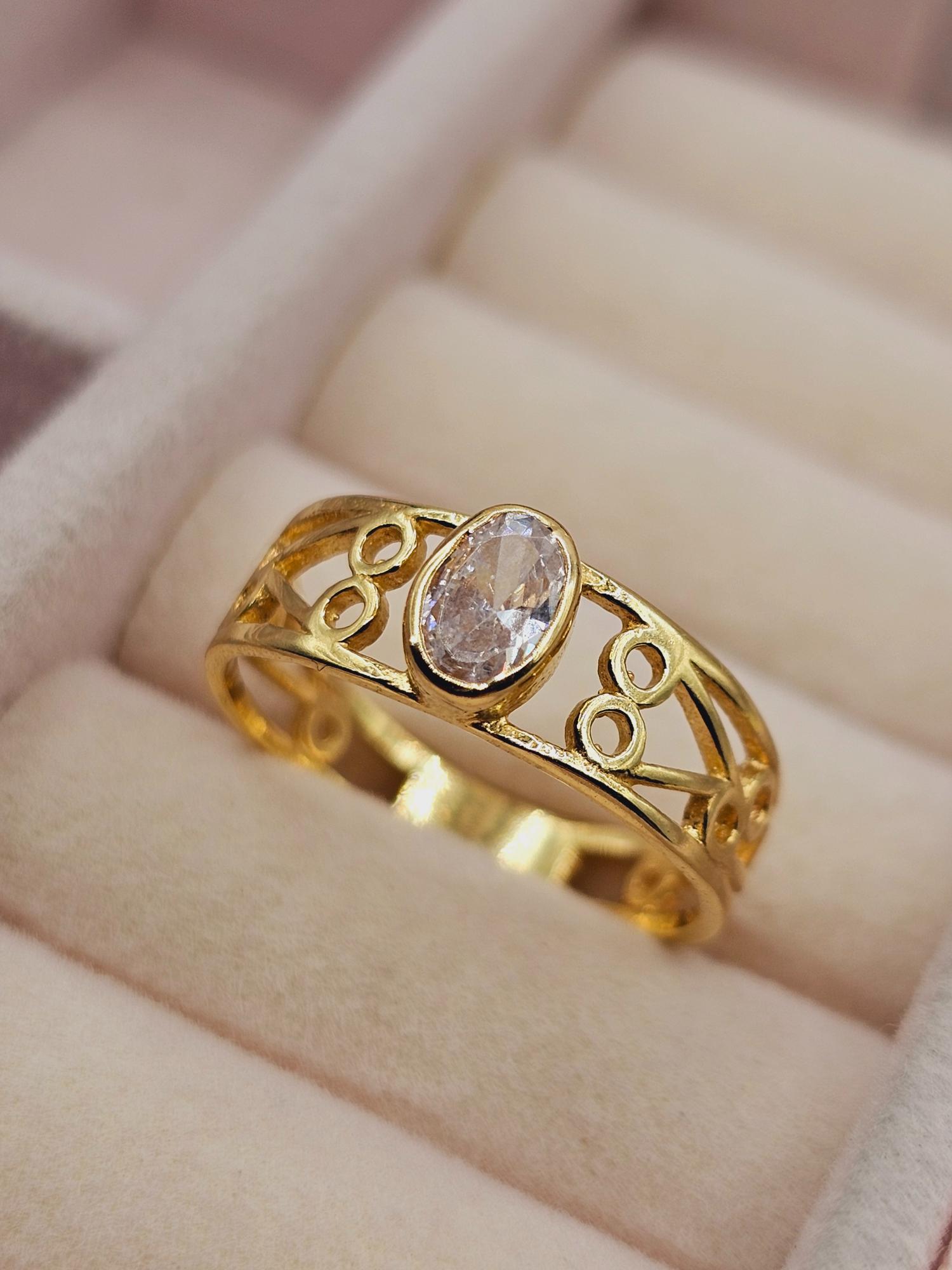 Anillo olimpo circones 2.6 grs Oro 18k 1