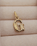 Colgante letra G 1.6 cm 0.7 grs Oro 18k