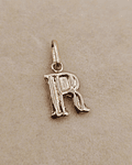 Colgante letra R 1.6 cm 0.7 grs Oro 18k