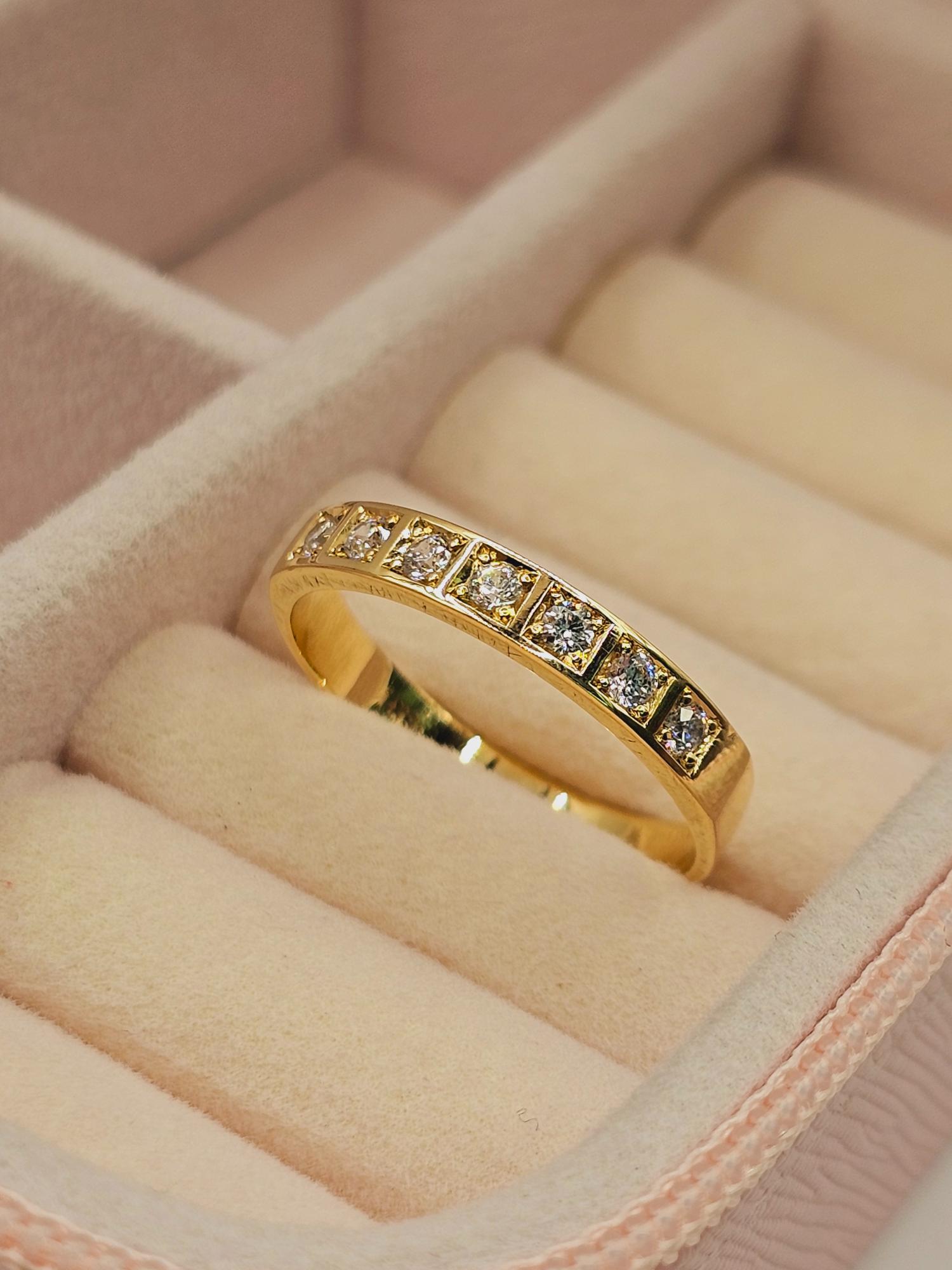 Anillo medio cintillo circones 3.1 grs Oro 18k 7