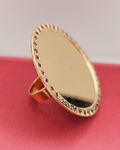 Anillo tazo disco con rubíes 4 cm 14 grs Oro 18k