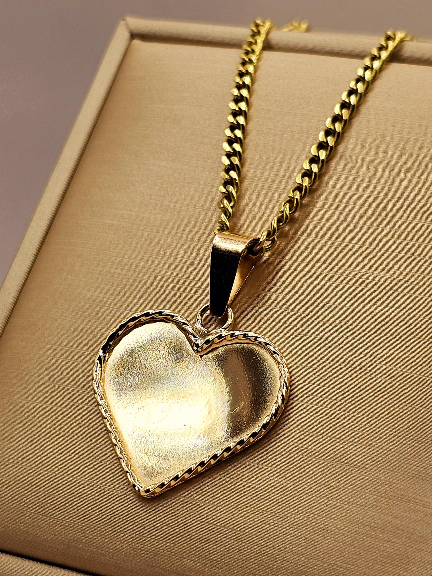 Cadena Grumete 50 cm y corazón 3.5 cm 17 grs Oro 18k 6