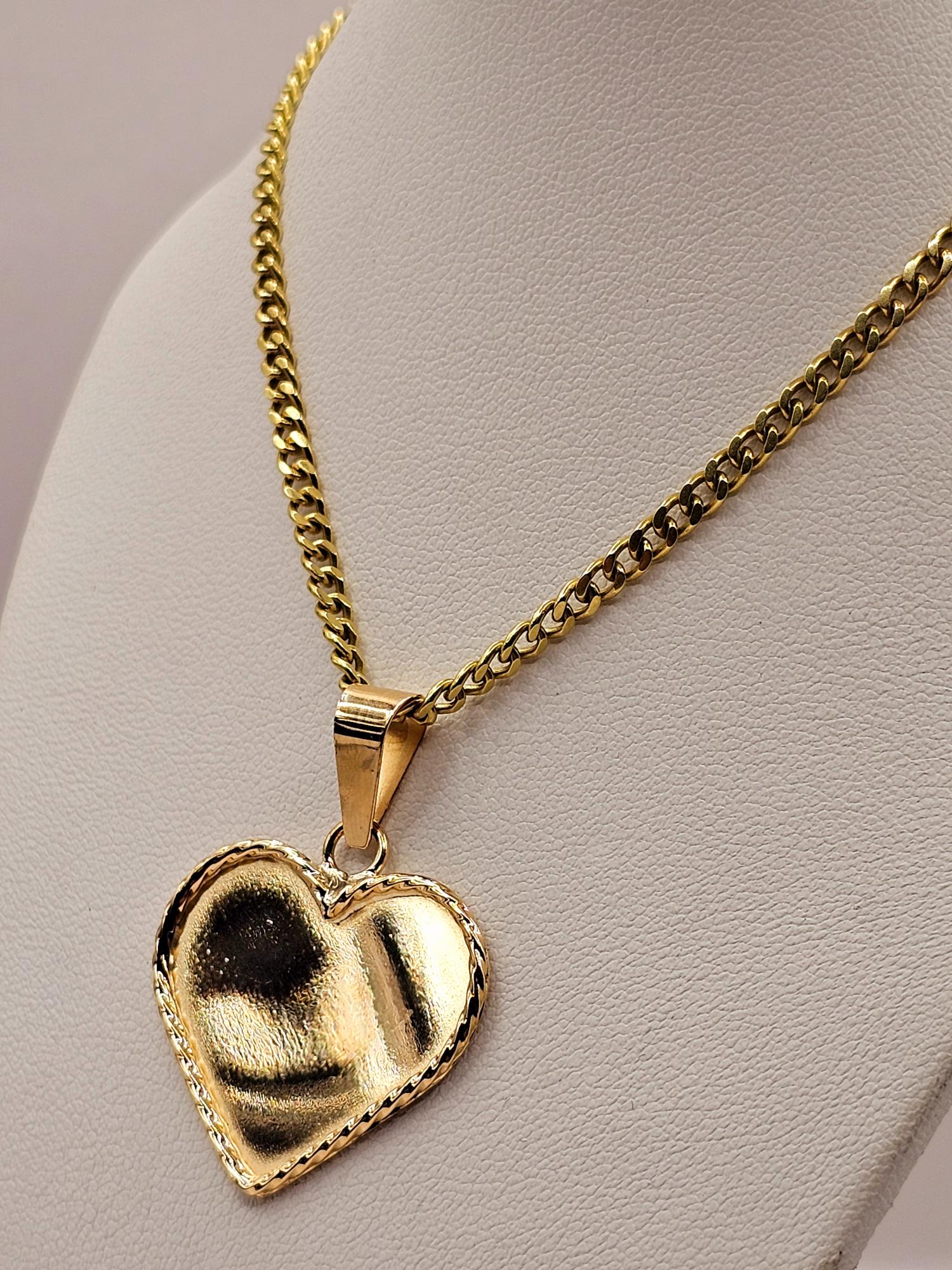 Cadena Grumete 50 cm y corazón 3.5 cm 17 grs Oro 18k 3