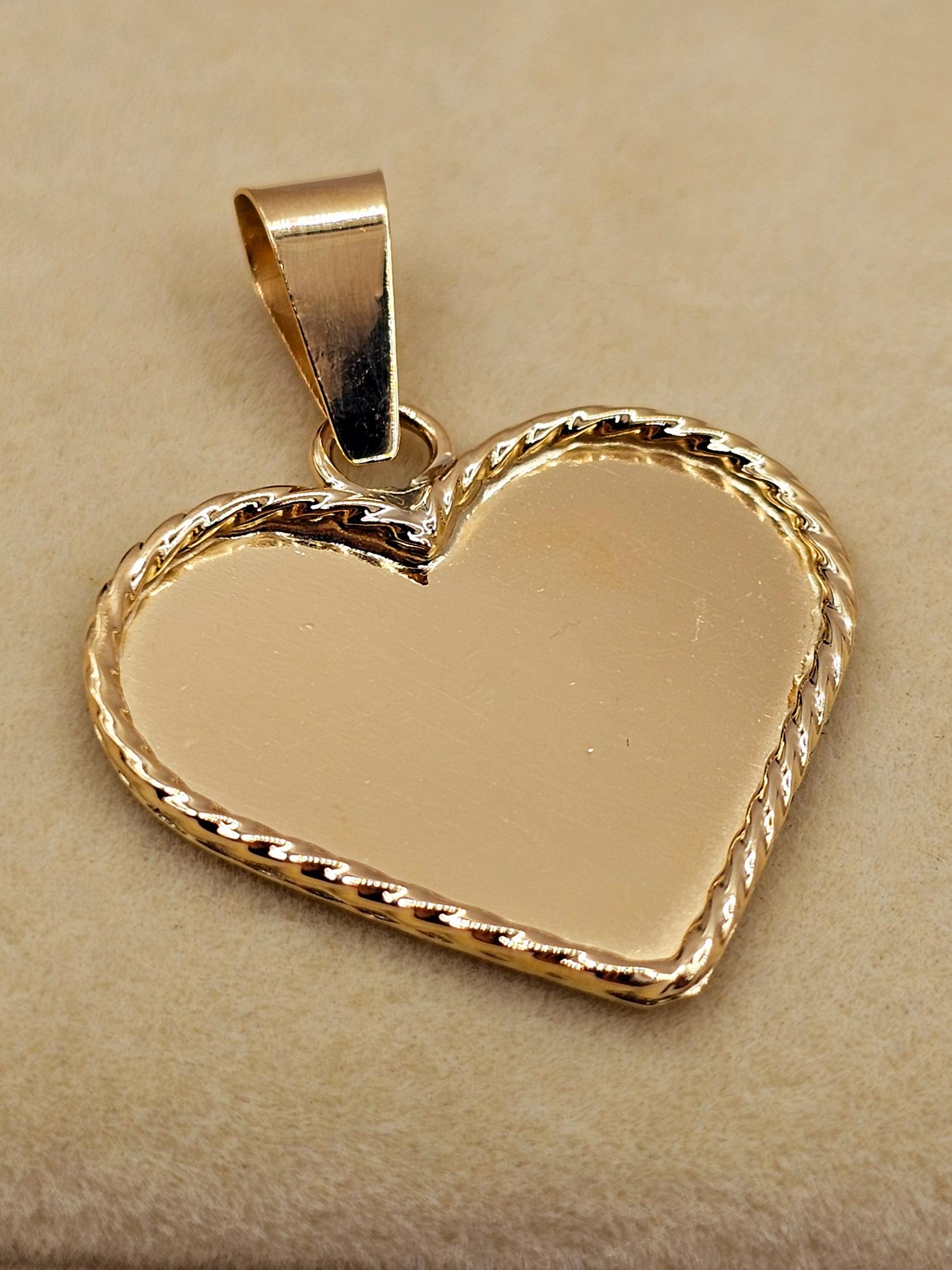 Colgante corazón trenza 3.5 cm 2.6 grs Oro 18k 2