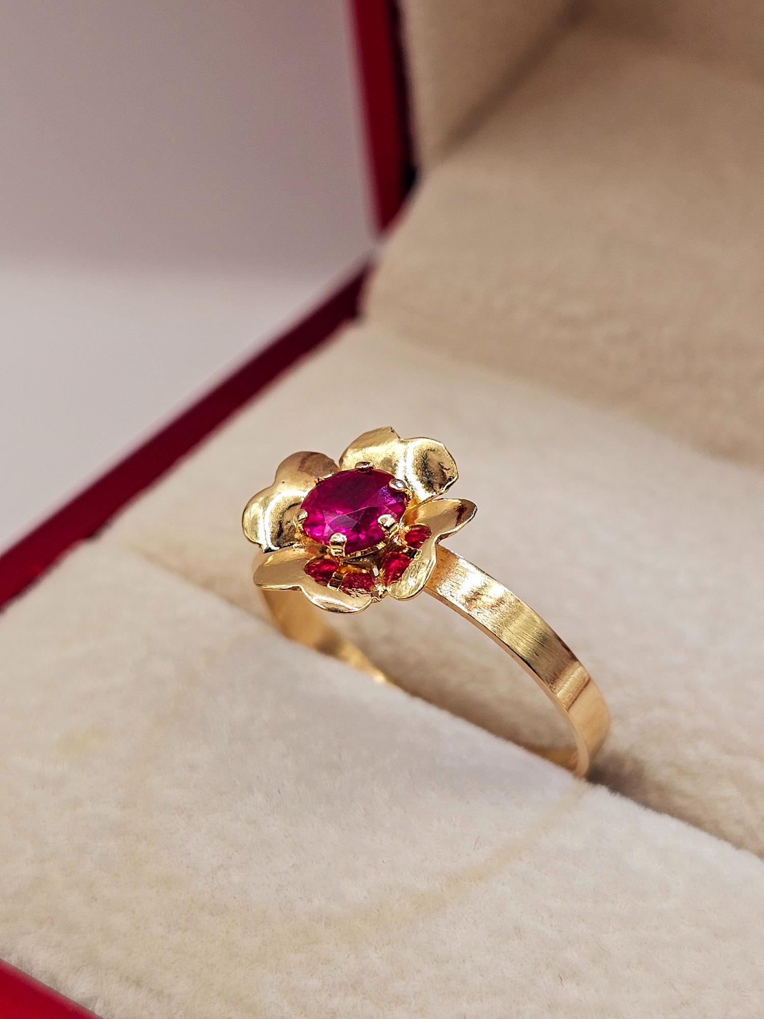 Anillo flor rubí 1.7 grs Oro 18k 4