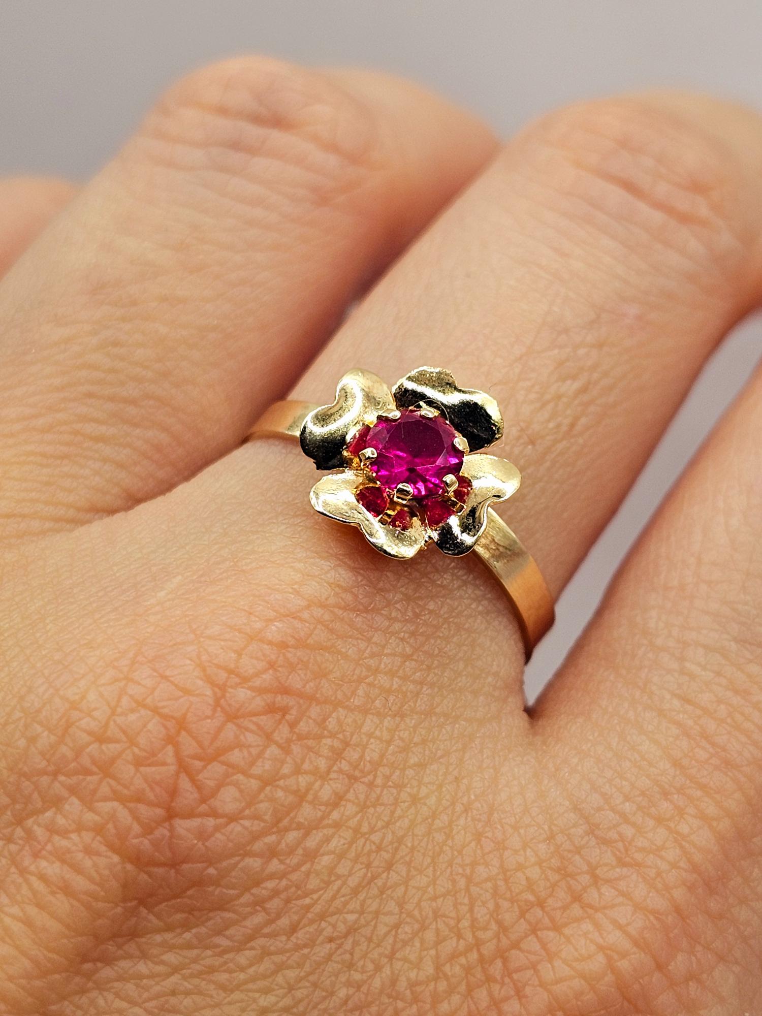 Anillo flor rubí 1.7 grs Oro 18k 5