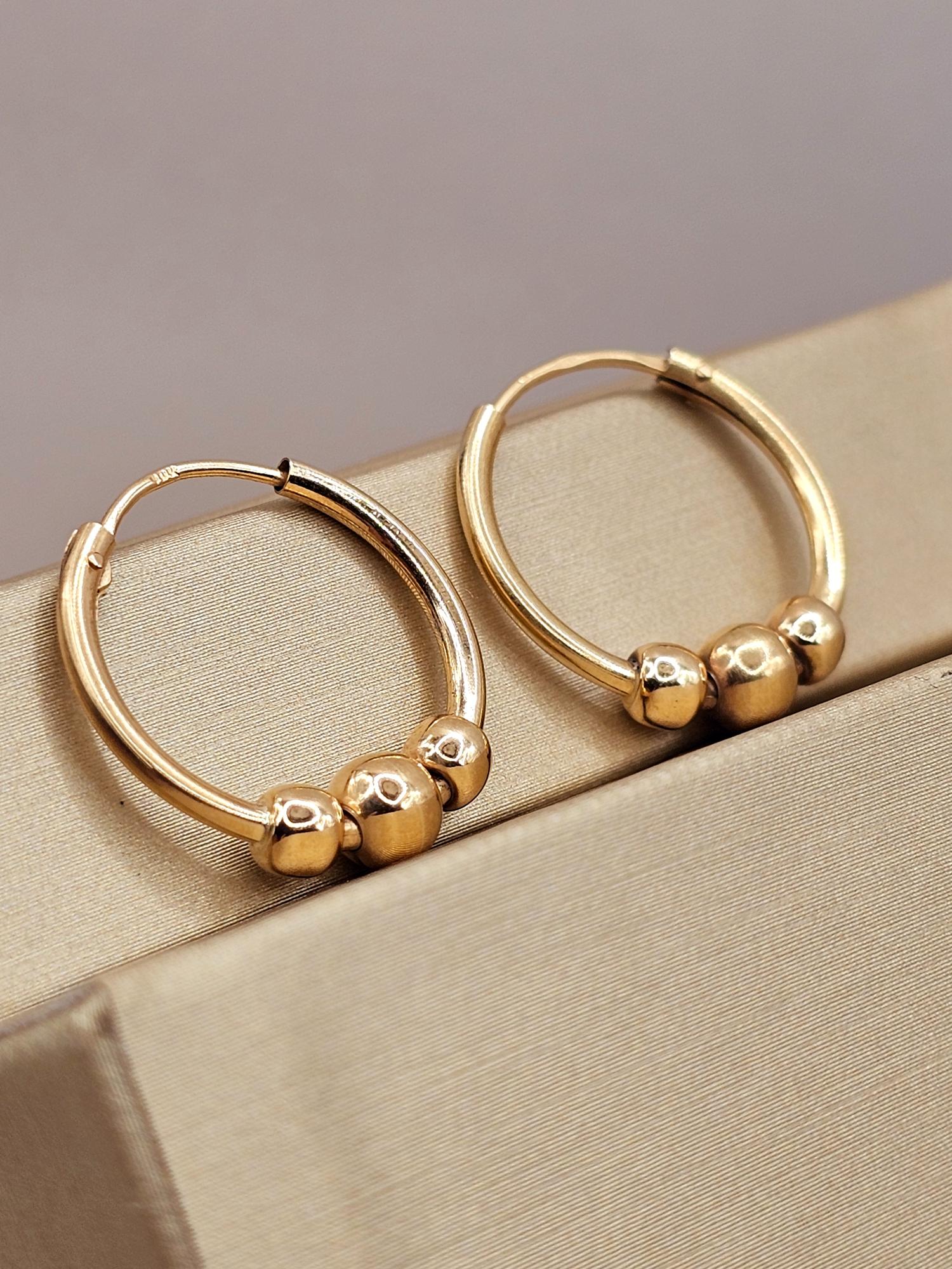 Aros argolla tubo bolitas 2 cm 2.2 grs Oro 18k 1