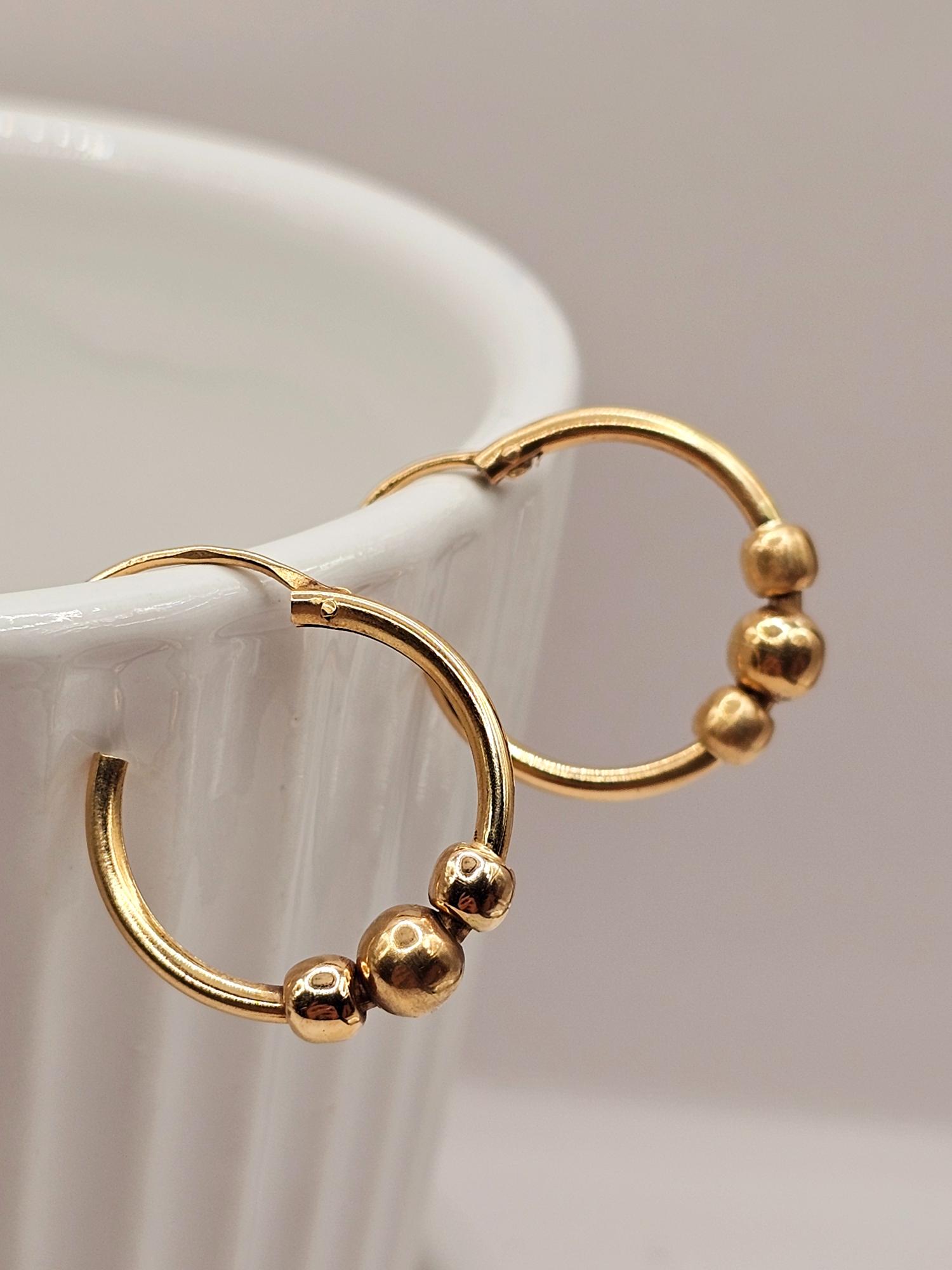 Aros argolla tubo bolitas 2 cm 2.2 grs Oro 18k 2