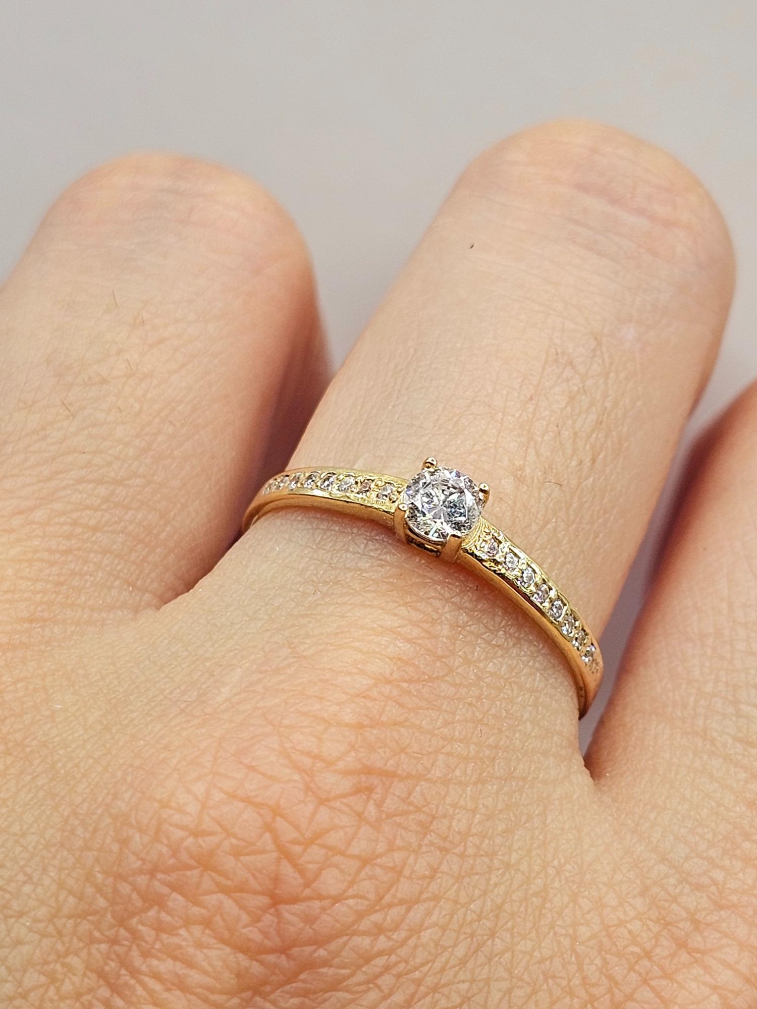 Anillo solitario Cintillo circones 1.9 grs Oro 18k 5