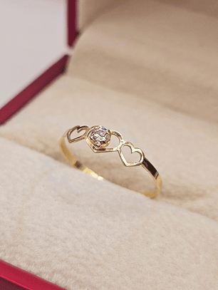 Anillo silueta tres corazones circón 0.7 grs Oro 18k