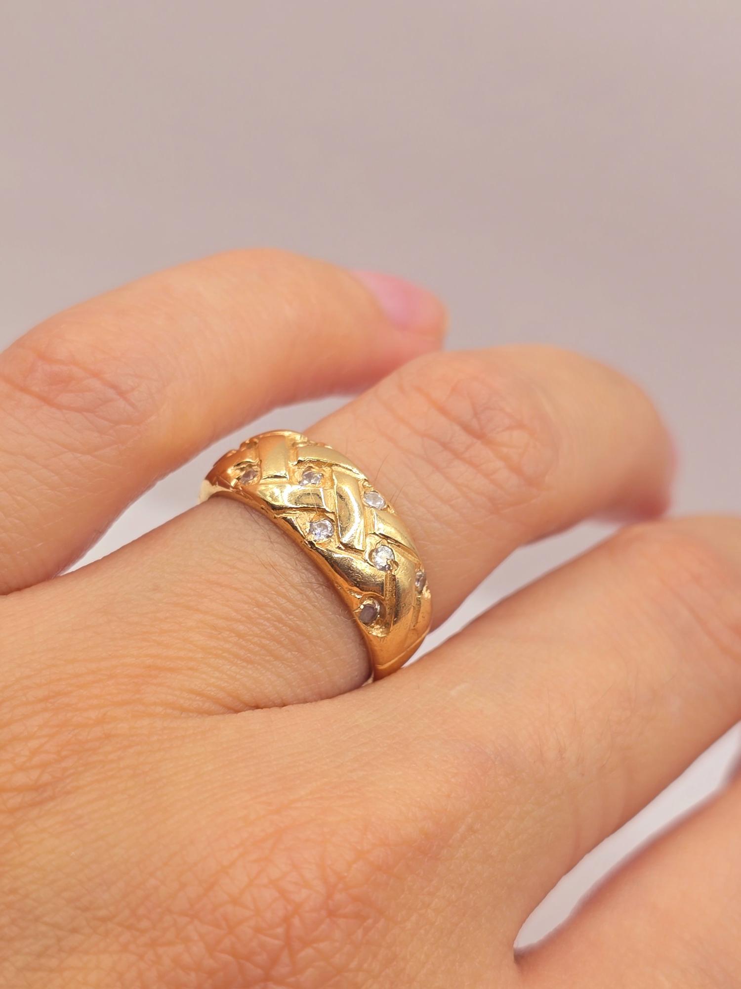 Anillo trenza circones 4.7 grs Oro 18k 1