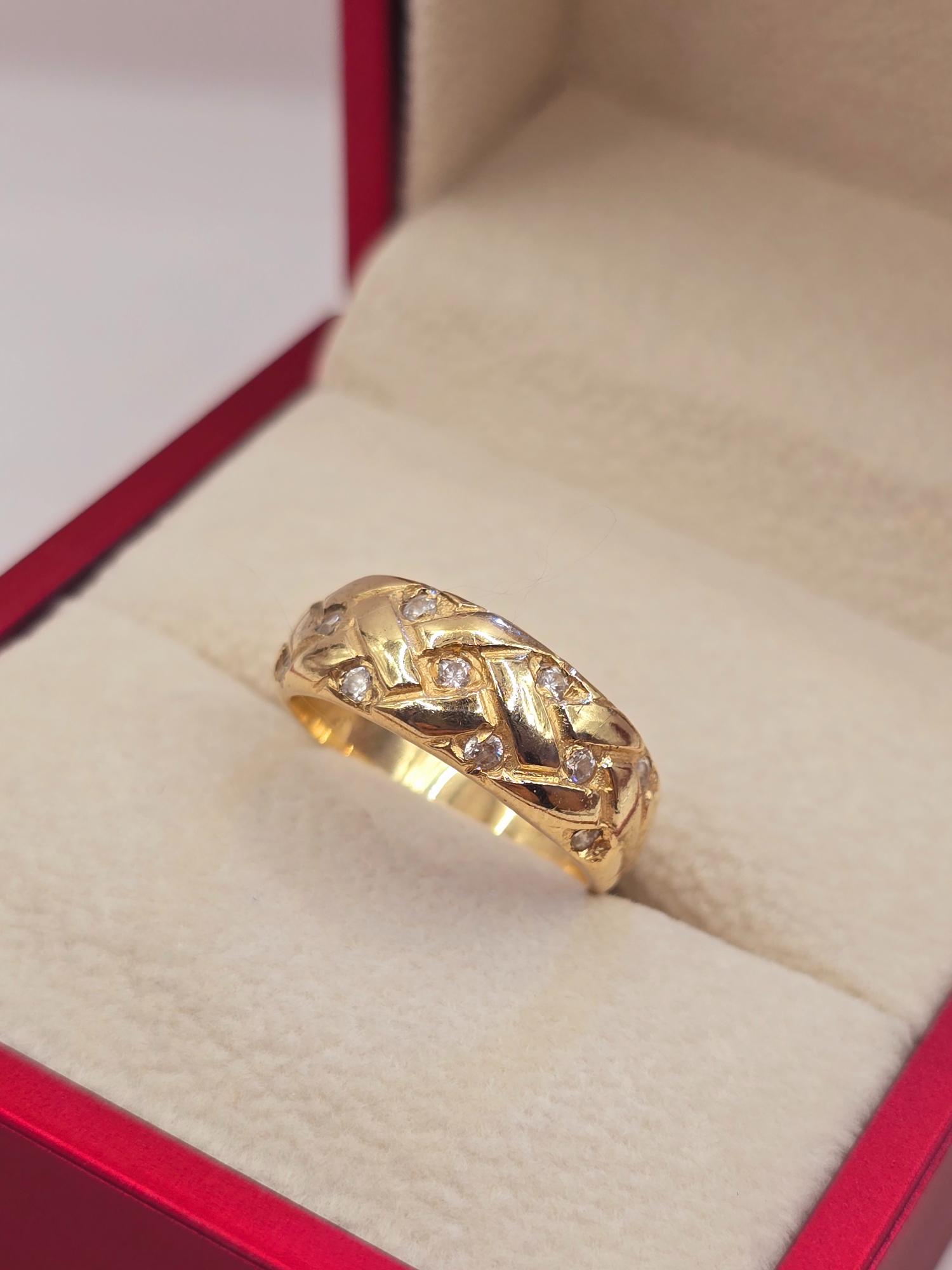 Anillo trenza circones 4.7 grs Oro 18k 5