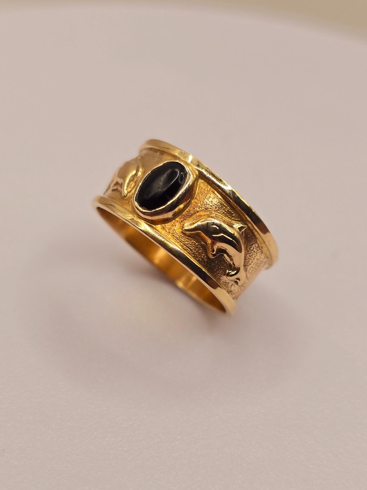 Anillo delfines y onix 9 mm 4 grs Oro 18k 6