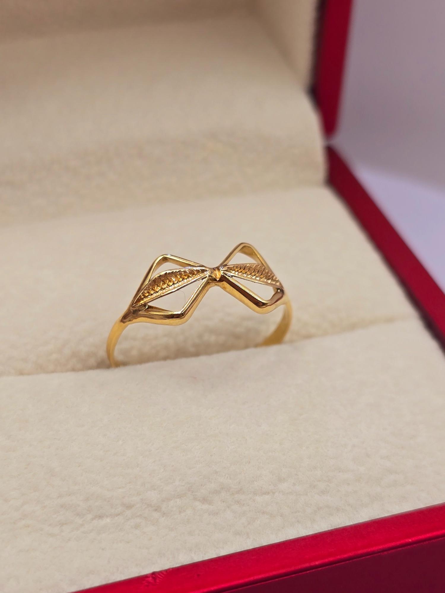 Anillo cinta 1.5 grs Oro 18k 3