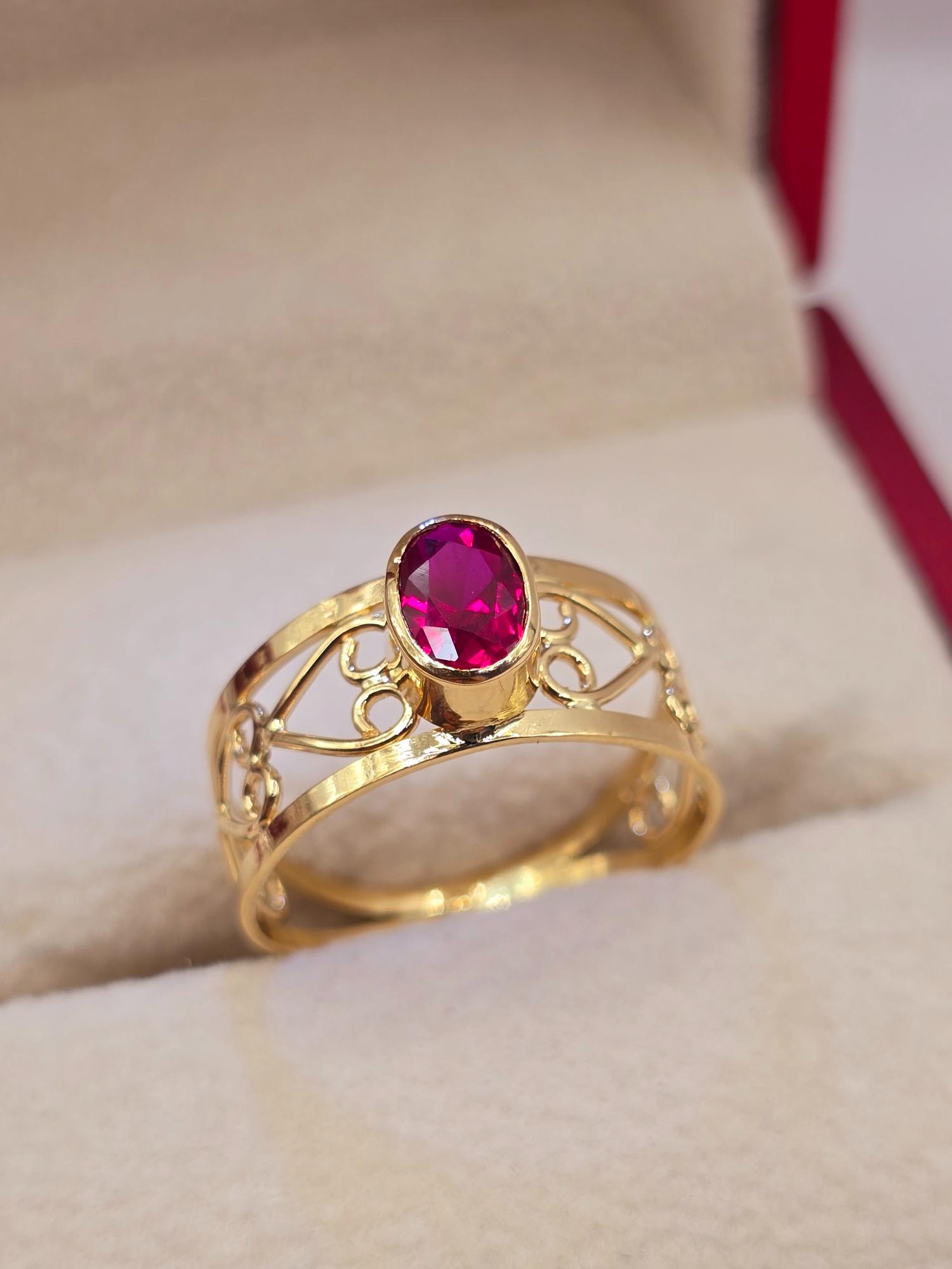 Anillo olimpo rubí 3 grs Oro 18k 5